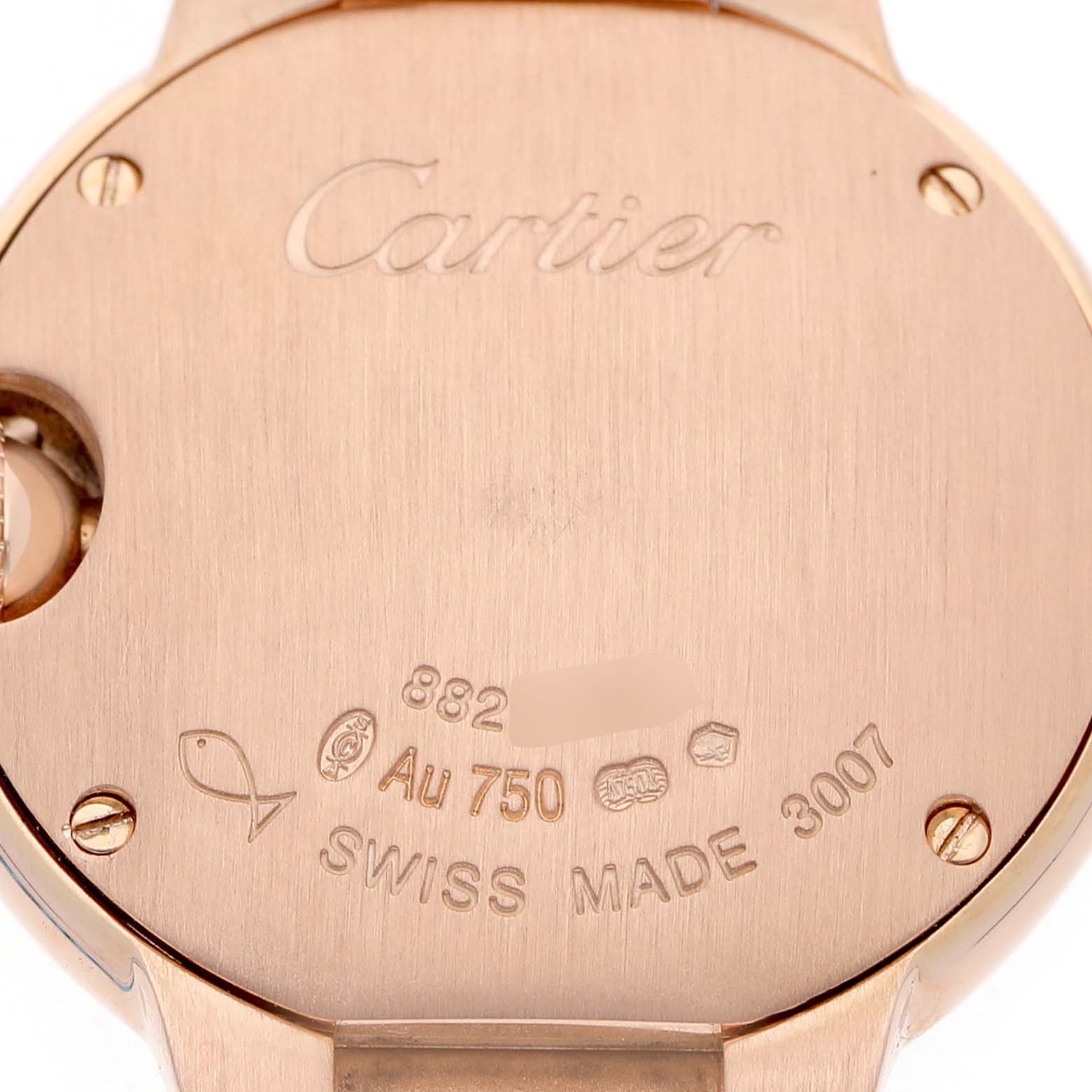 The image shows the back of the Cartier Ballon Bleu W69002Z2 Women's Rose Gold Silver Dial watch, highlighting engravings and gold hallmarks.