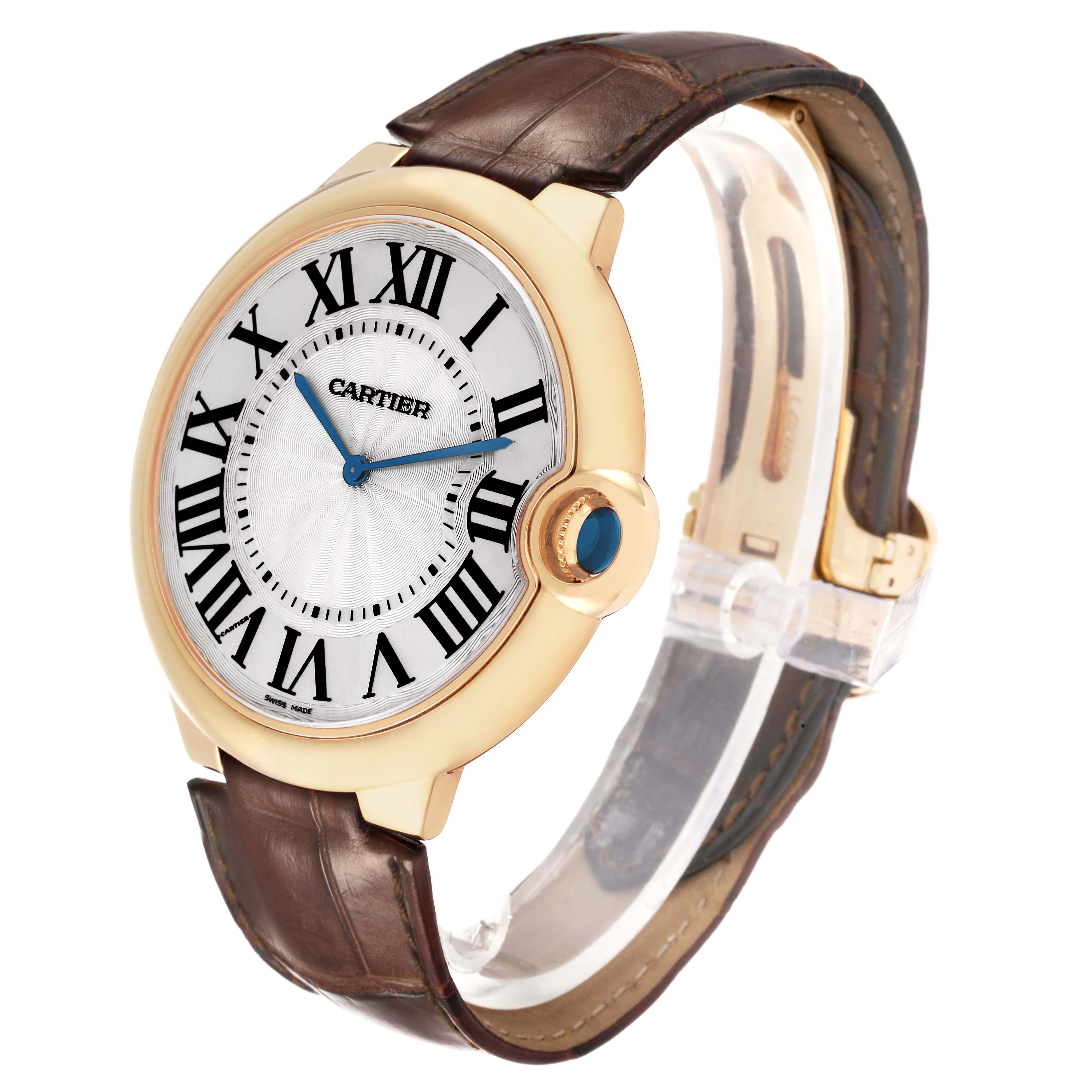 The Cartier Ballon Bleu W690054 Men's Yellow Gold Silver Dial watch is shown at a slight angle, highlighting the face, crown, and leather strap.