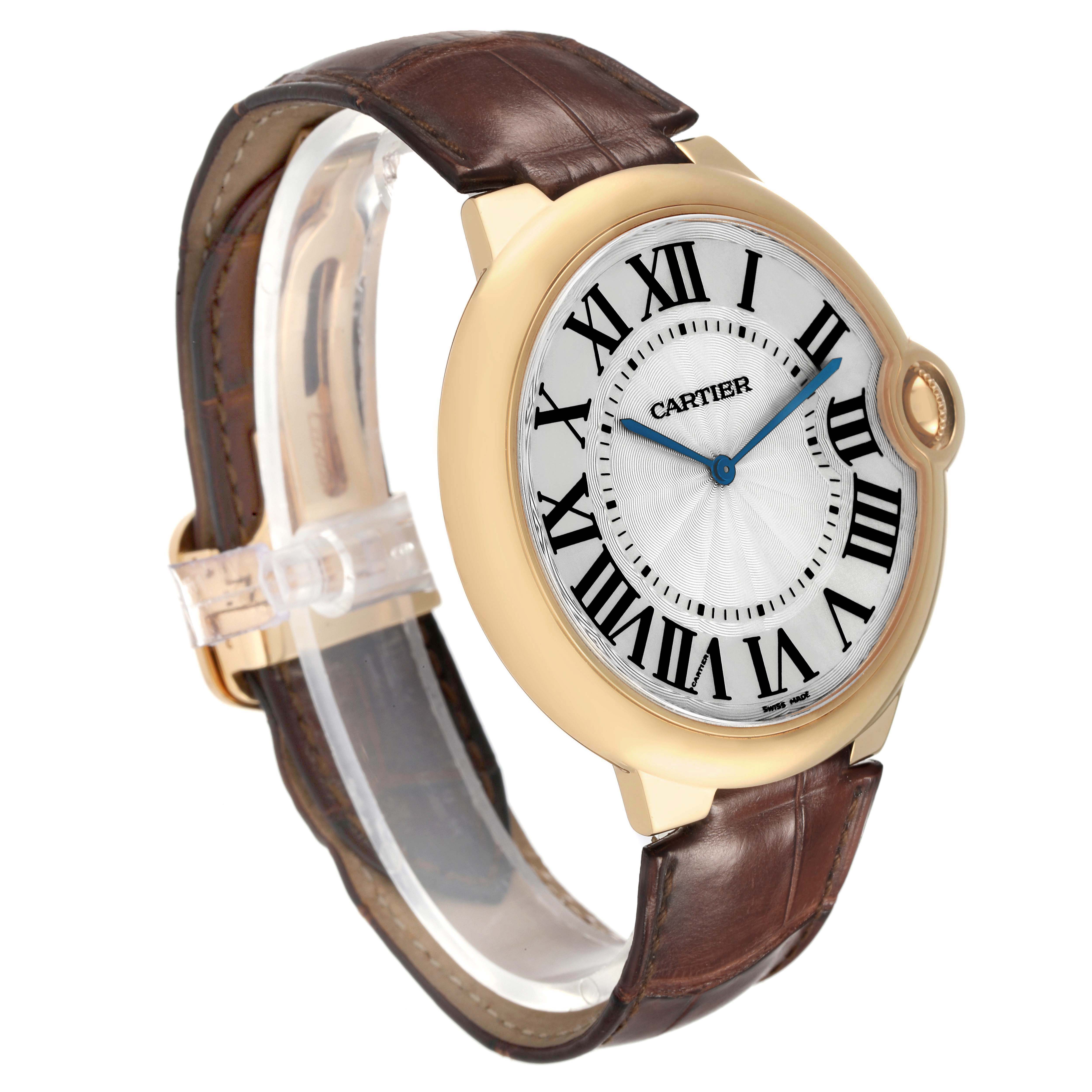 The Cartier Ballon Bleu W690054 Men's Yellow Gold Silver Dial watch is shown at a three-quarter angle, emphasizing the dial, case, and leather strap.