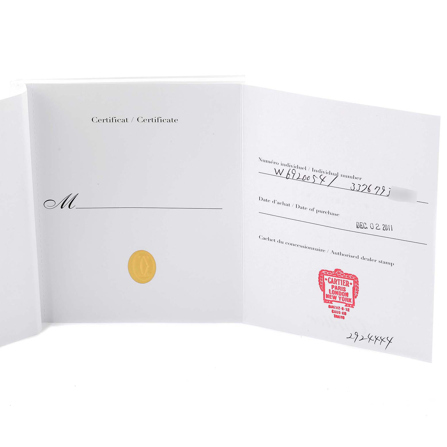 This image shows the open warranty certificate for a Ballon Bleu model by Cartier, including the date of purchase and dealer stamp.