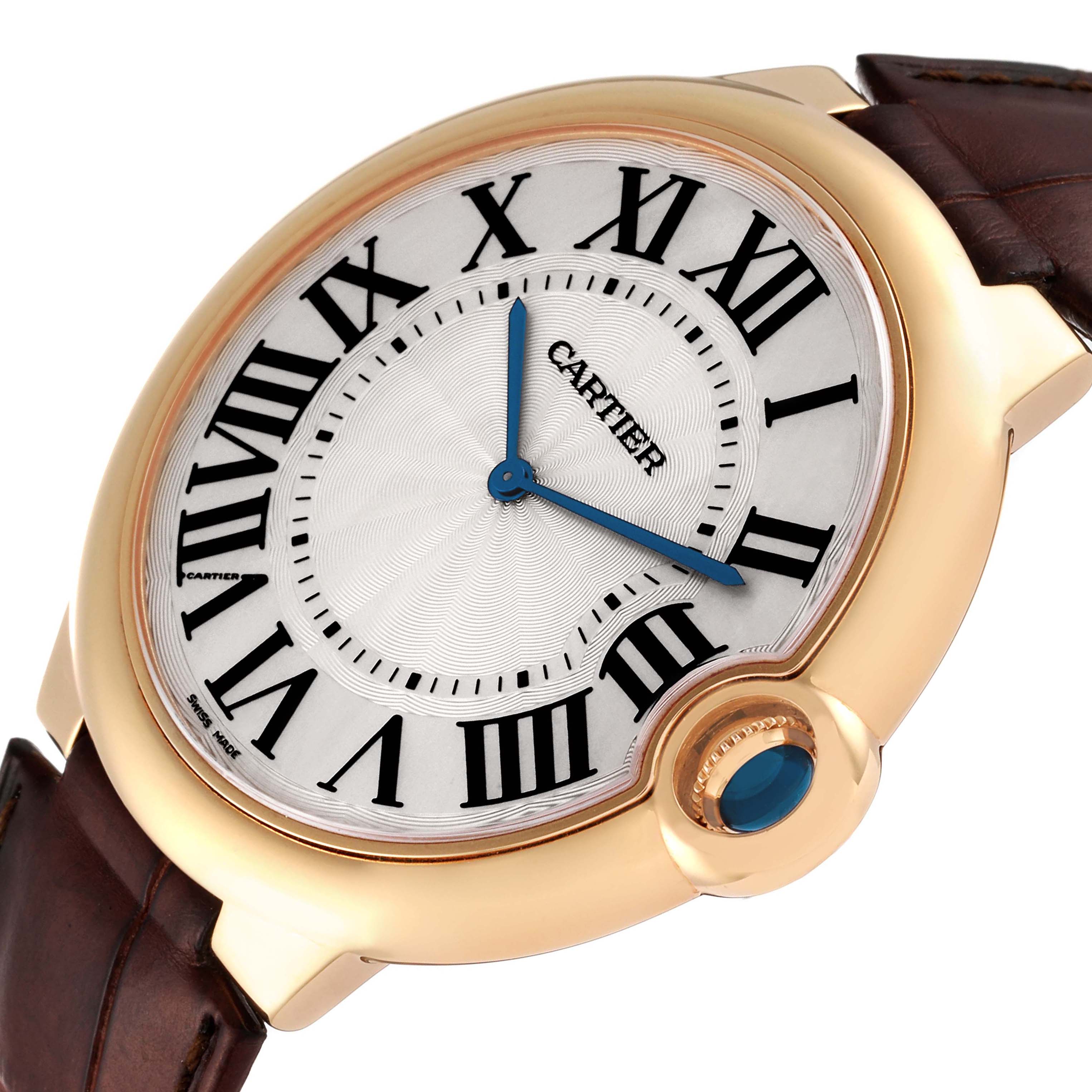 The image shows a close-up of the Cartier Ballon Bleu W690054 Men's Yellow Gold Silver Dial W690054 Men's Yellow Gold Silver Dial watch face, highlighting the dial and crown from an angled side view.