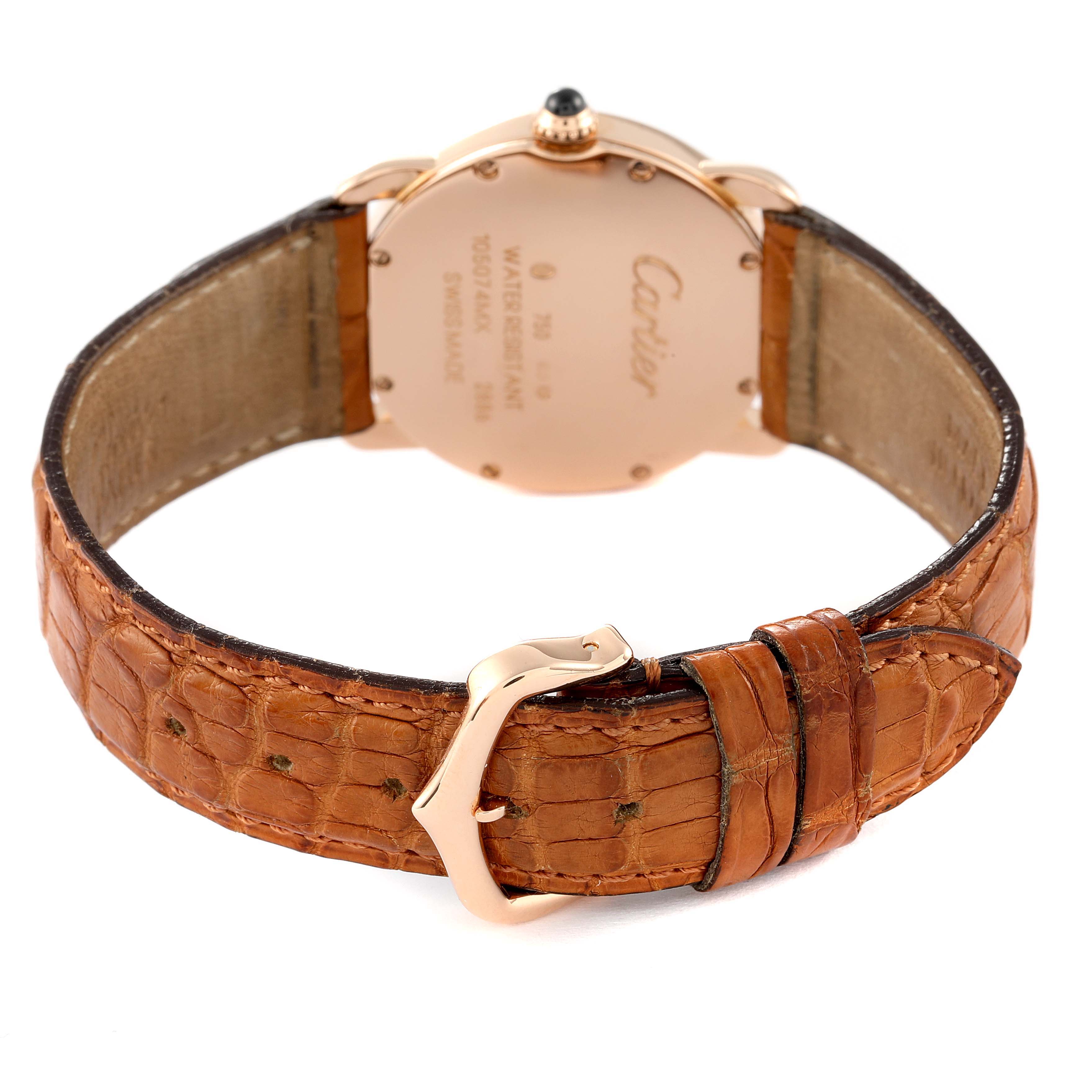 This image shows the back of a Cartier Ronde W6800151 Women's Rose Gold Silver Dial W6800151 Women's Rose Gold Silver Dial watch, focusing on its case back and brown leather strap with a gold buckle.