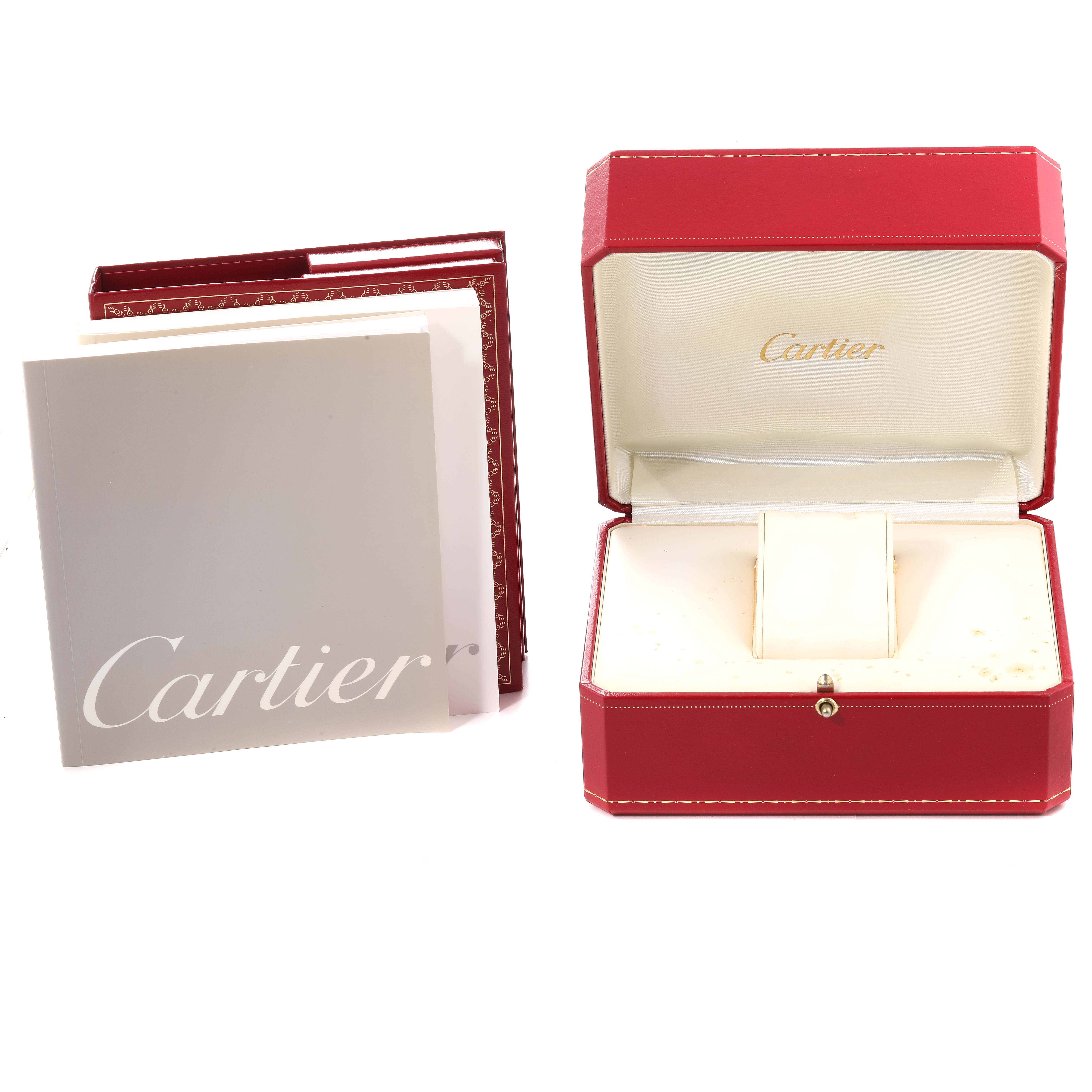 This image shows the box and booklets for the Cartier Tank Francaise W51012Q4 Women
s Stainless Steel Silver Dial W51012Q4 Women
s Stainless Steel Silver Dial watch.