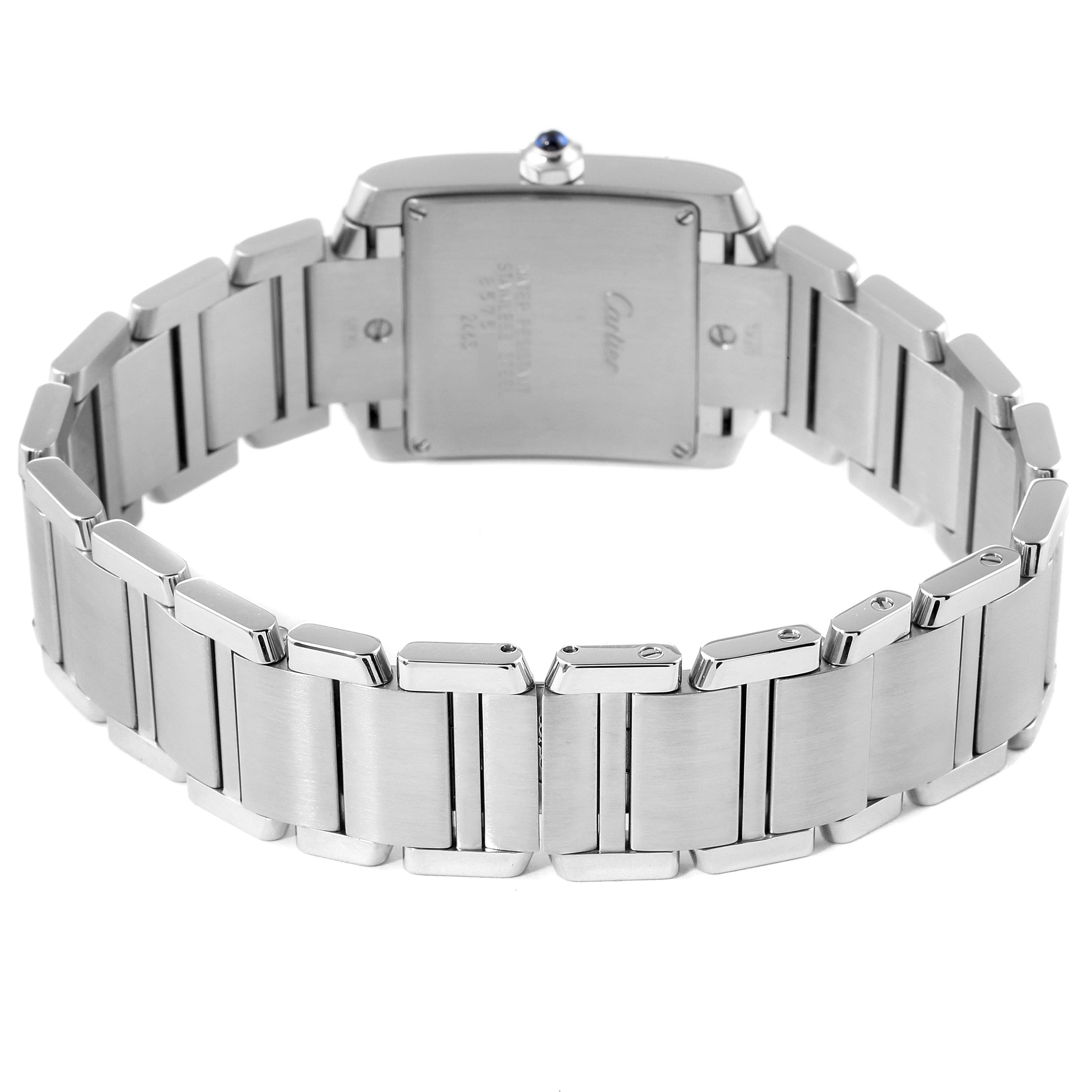 This image shows the back view of the Cartier Tank Française watch, focusing on its stainless steel bracelet and case back.