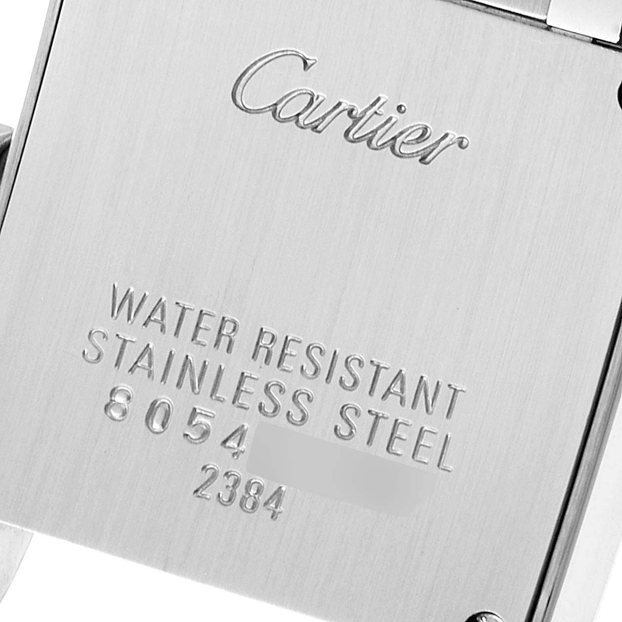 The image shows the back of a Cartier Tank Francaise W51008Q3 Women
s Stainless Steel Silver Dial W51008Q3 Women
s Stainless Steel Silver Dial watch, highlighting its stainless steel and water resistance features.