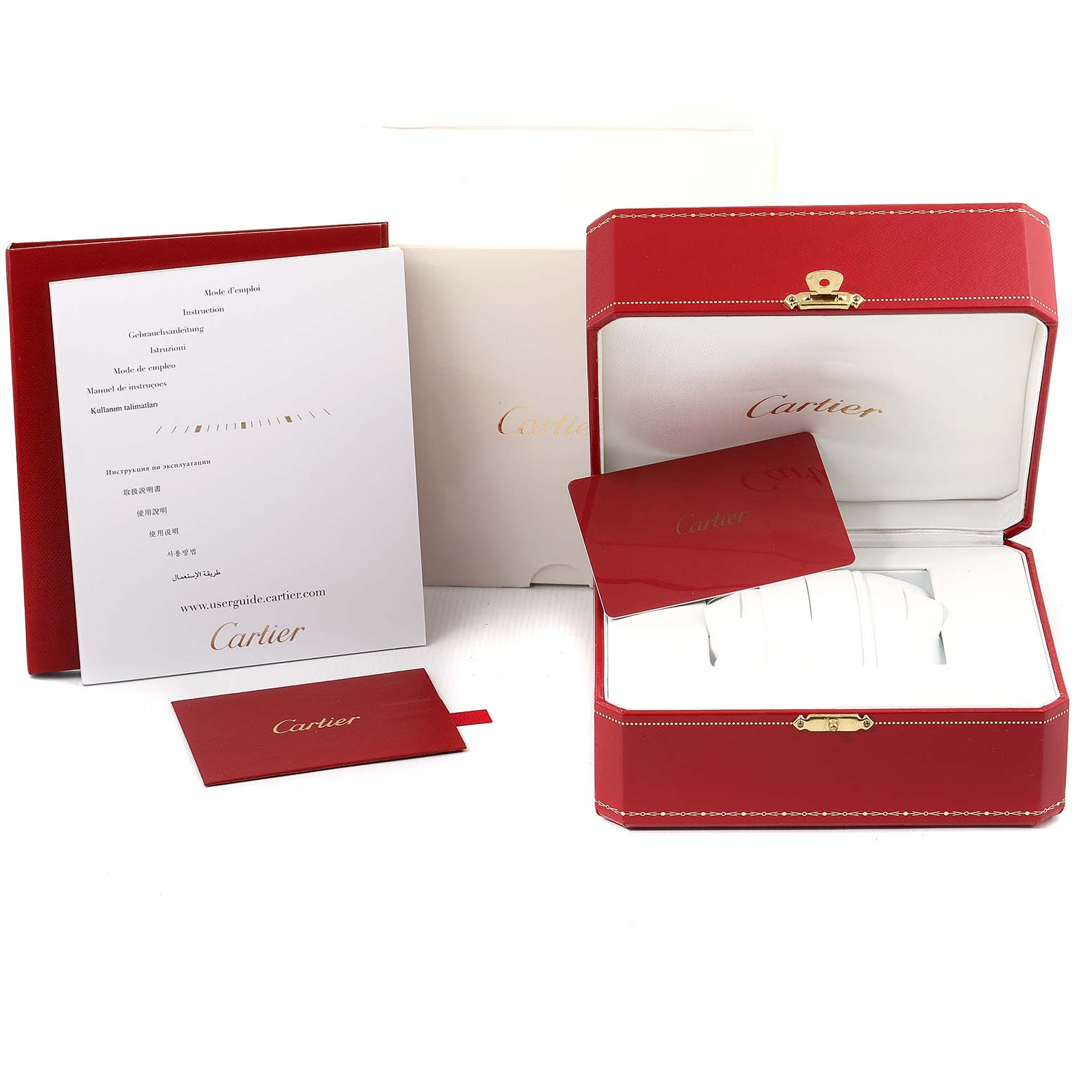 The image shows the Cartier Tank Francaise WE110004 Women's Steel and Gold (two tone) Silver Dial WE110004 Women's Steel and Gold (two tone) Silver Dial watch packaging, including boxes, manuals, and accessories, from a straight-on angle.