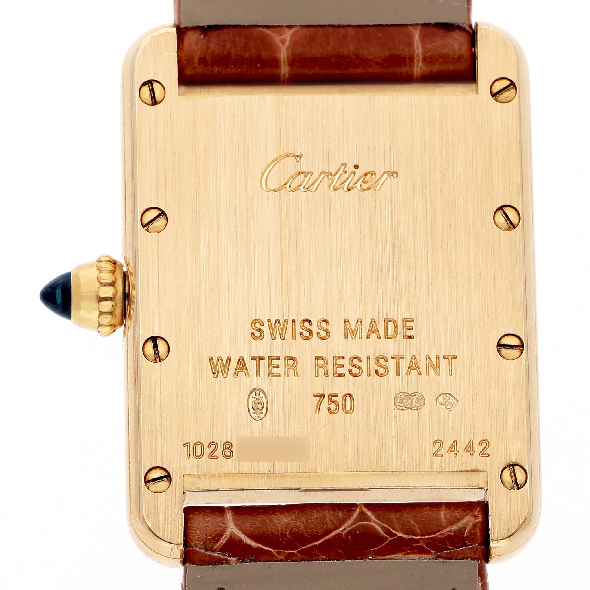 The image shows the back of a Cartier Tank Louis W1529856 Women's Yellow Gold Silver Dial watch, highlighting its gold casing, engravings, and leather strap attachment.
