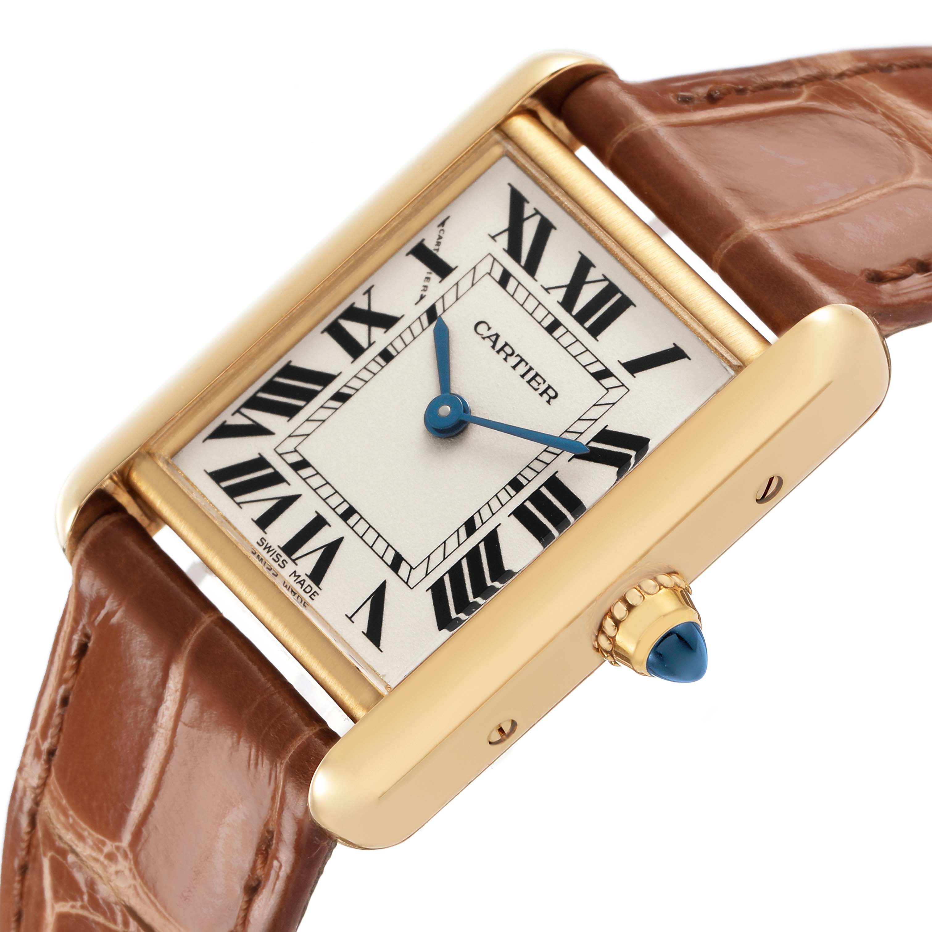 The Cartier Tank Louis W1529856 Women's Yellow Gold Silver Dial watch is shown at an angle highlighting its gold rectangular case, Roman numeral dial, and brown leather strap.