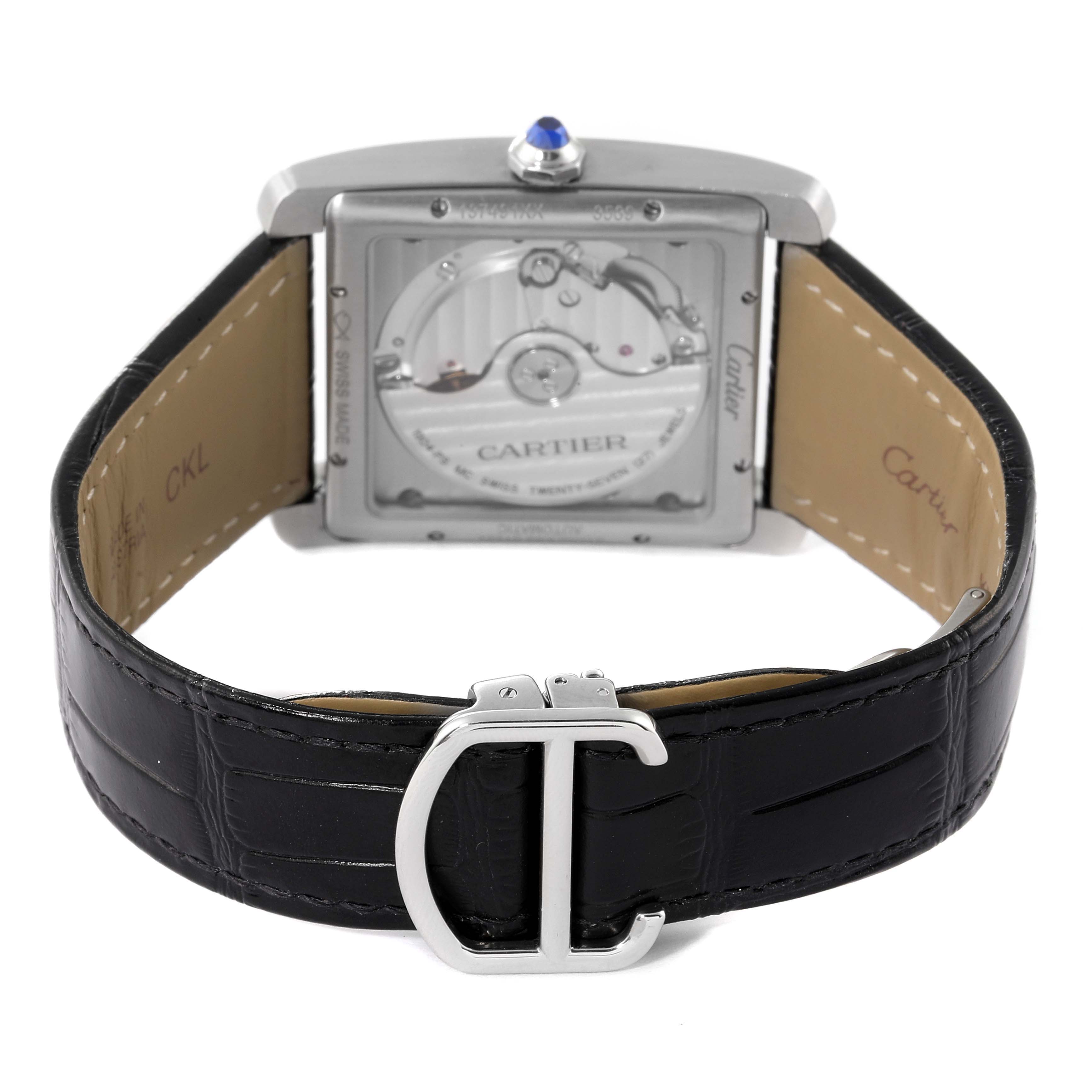 The image shows the back view of a Cartier Tank MC WSTA0010 Men
s Stainless Steel Blue Dial WSTA0010 Men
s Stainless Steel Blue Dial watch, highlighting the movement, strap, and clasp.