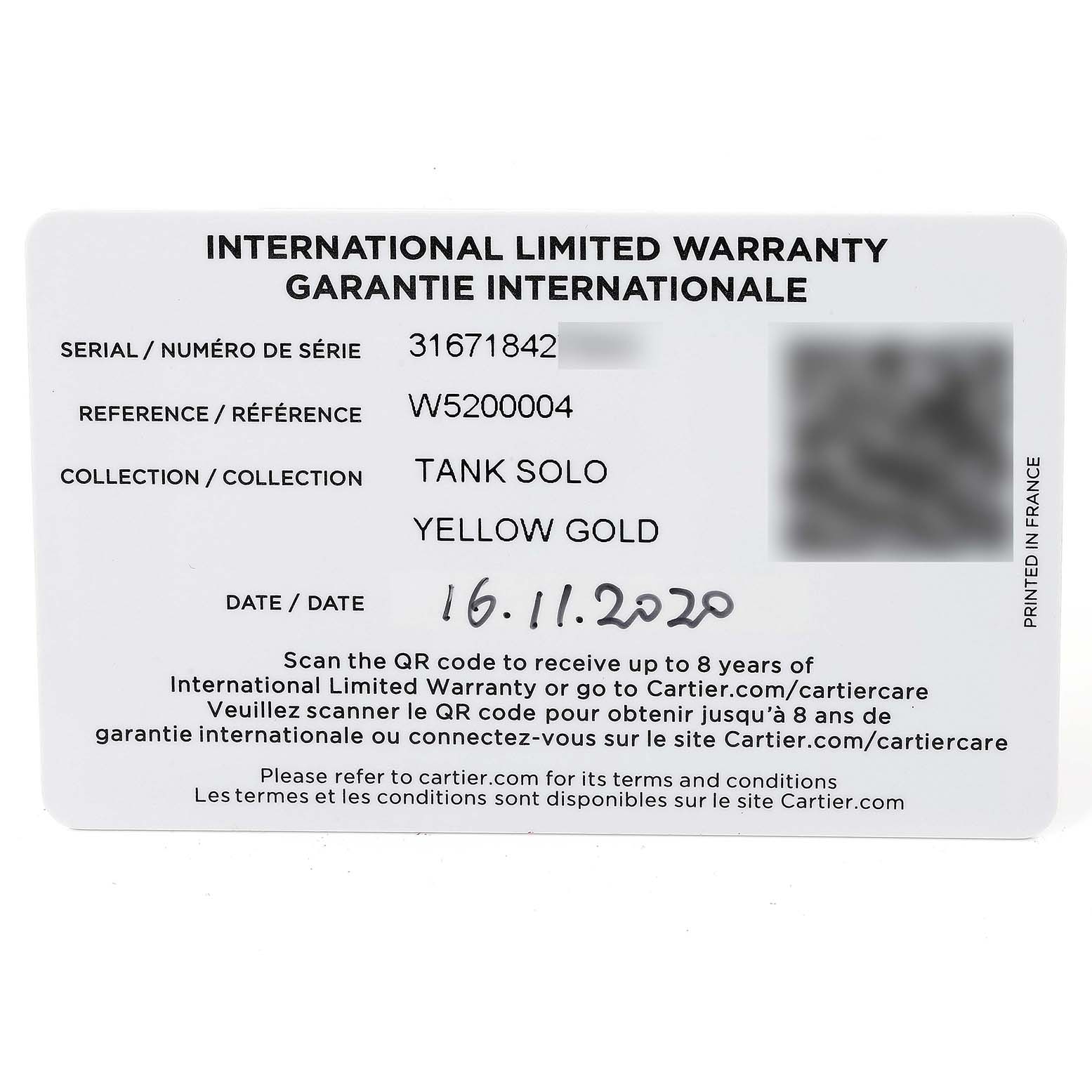 The image shows an international limited warranty card for the Cartier Tank Solo W5200004 Men
s Yellow Gold Silver Dial W5200004 Men
s Yellow Gold Silver Dial watch, model W5200004 in yellow gold.