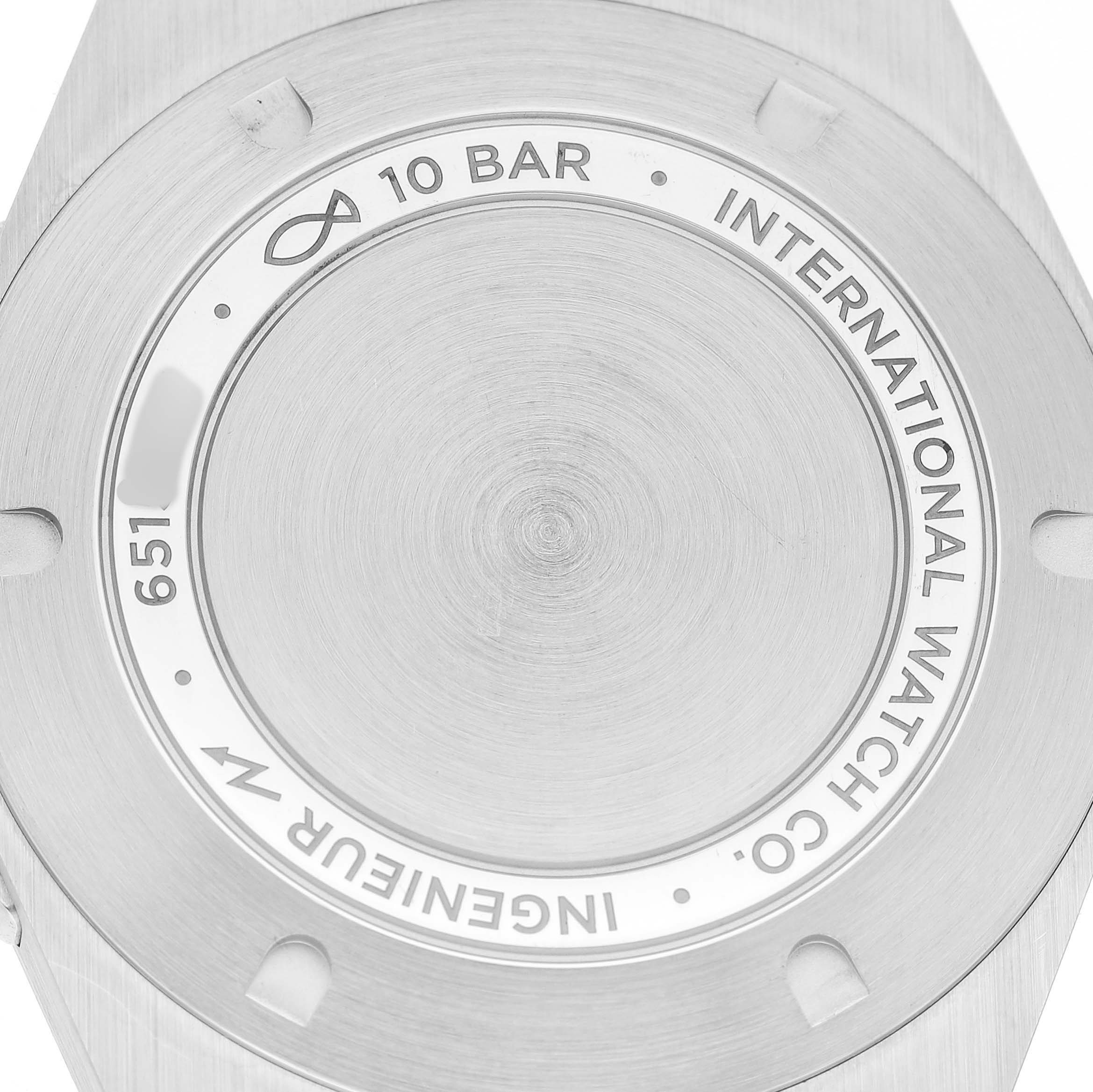 The image shows the back case of the IWC Ingenieur IW328903 Men's Stainless Steel Blue Dial watch, featuring engraved text and water resistance details.