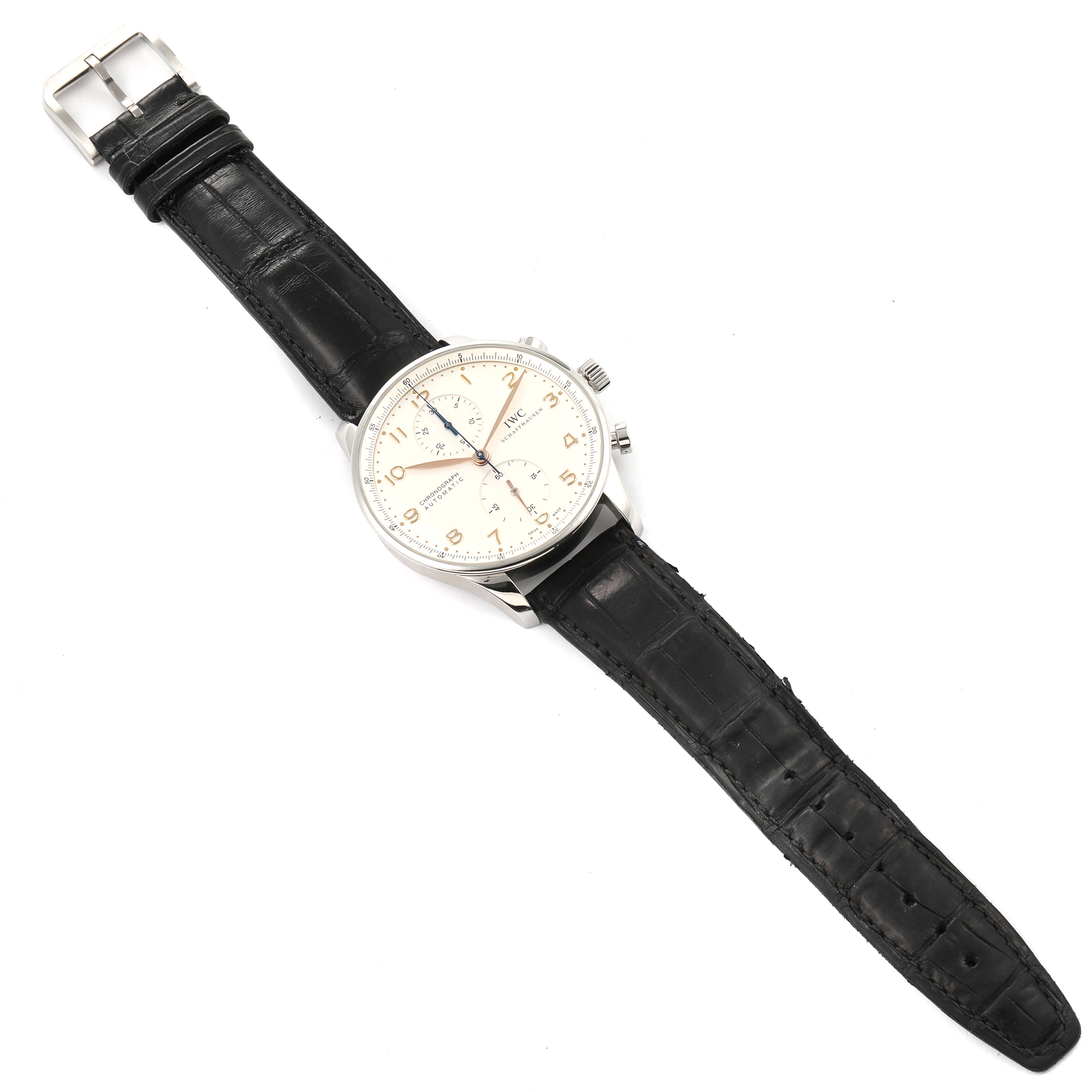 The image shows an IWC Portuguese IW371401 Men's Stainless Steel Silver Dial IW371401 Men's Stainless Steel Silver Dial watch at an overhead angle, displaying the face, bezel, crown, pushers, and entire black leather strap.