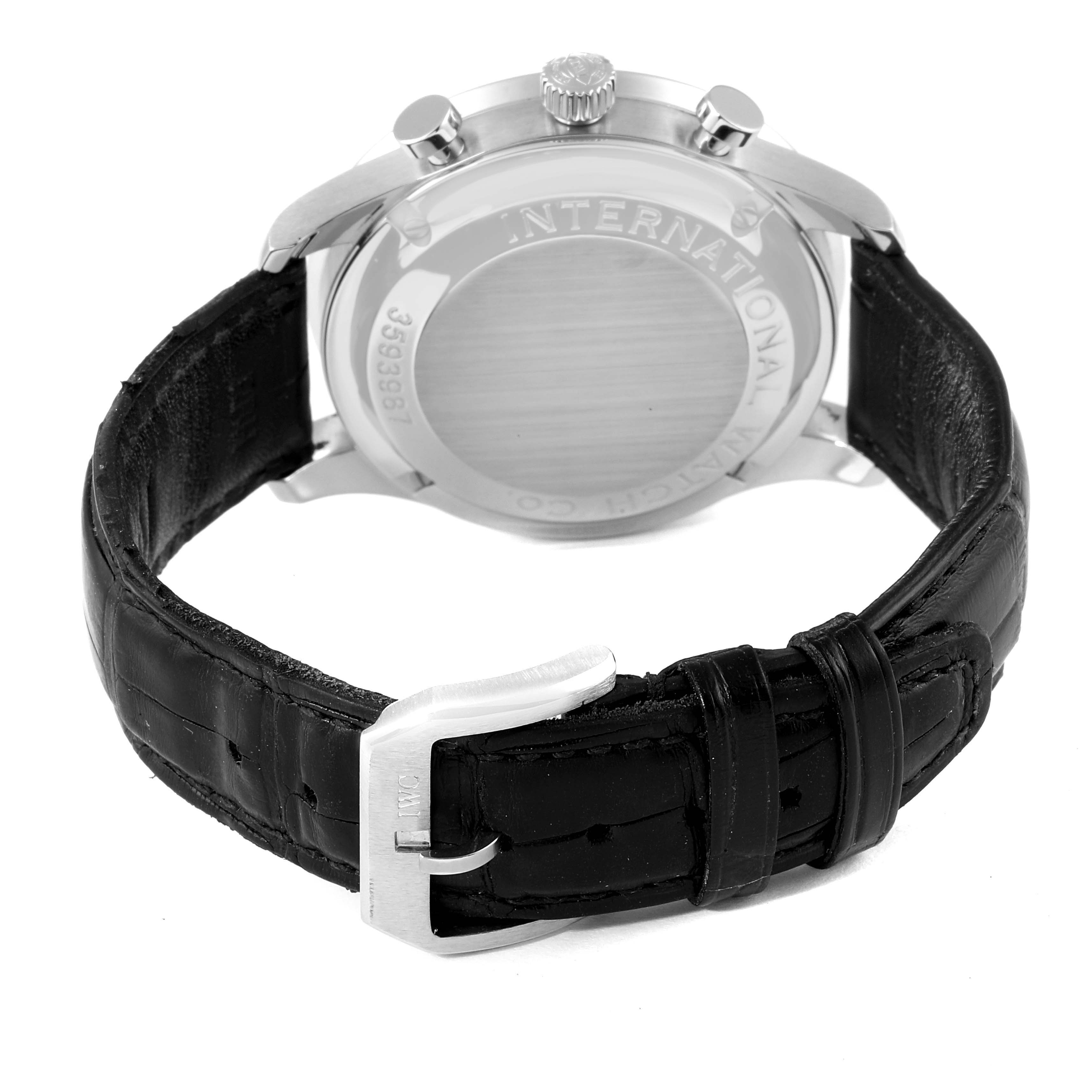 The image shows the rear view of an IWC Portuguese IW371401 Men's Stainless Steel Silver Dial IW371401 Men's Stainless Steel Silver Dial watch, highlighting its case back, crown, pushers, and black leather strap with a buckle.