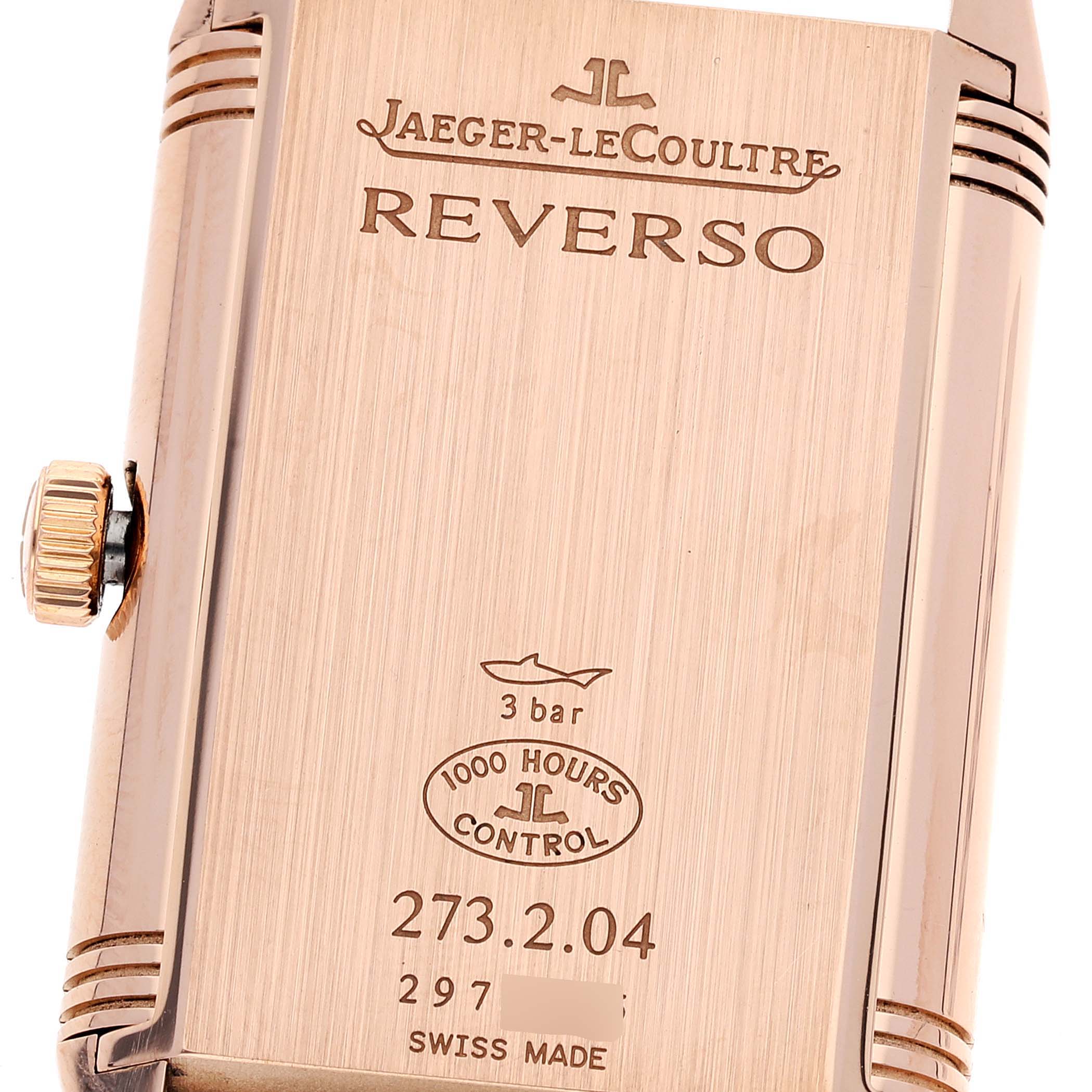 The image shows the caseback and crown of the Jaeger LeCoultre Reverso Q3732420 Men's Rose Gold Silver Dial Q3732420 Men's Rose Gold Silver Dial watch from an angled view.