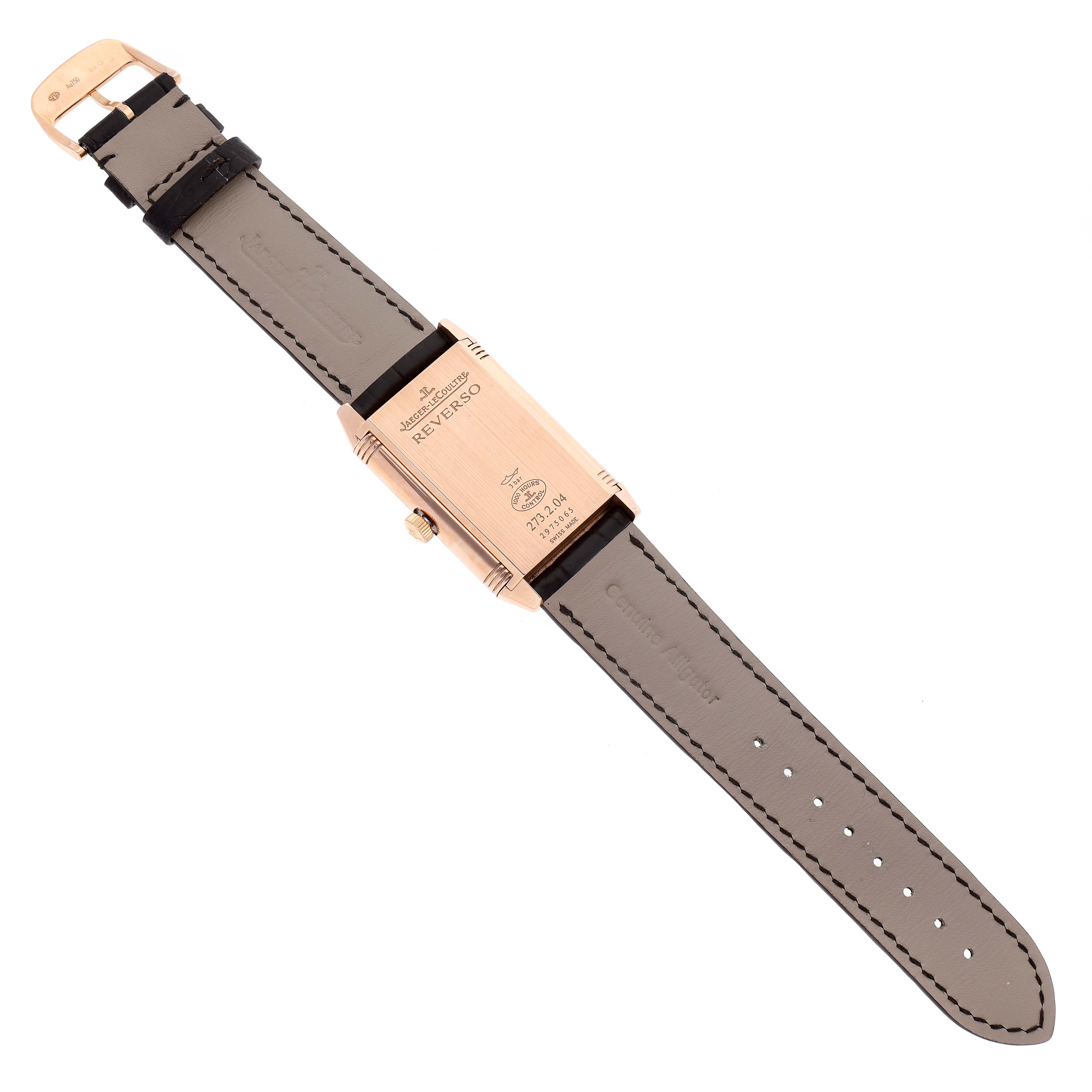This image shows the back view of a Jaeger-LeCoultre Reverso watch, including the watch case and leather strap.