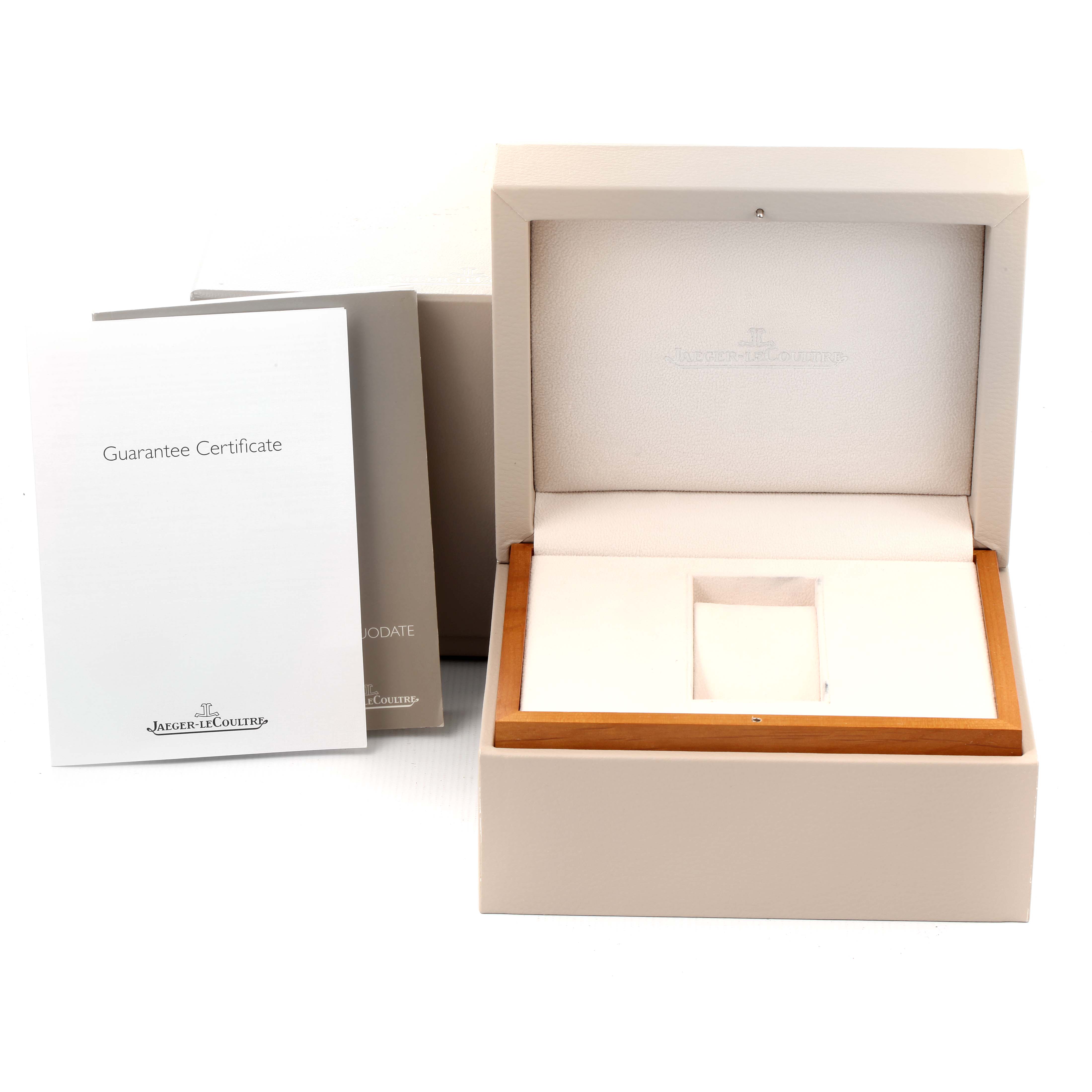 The image shows a Jaeger LeCoultre Reverso Q3742521 Men's Rose Gold Silver Dial Q3742521 Men's Rose Gold Silver Dial watch box and guarantee certificate placed at an angle from the front.