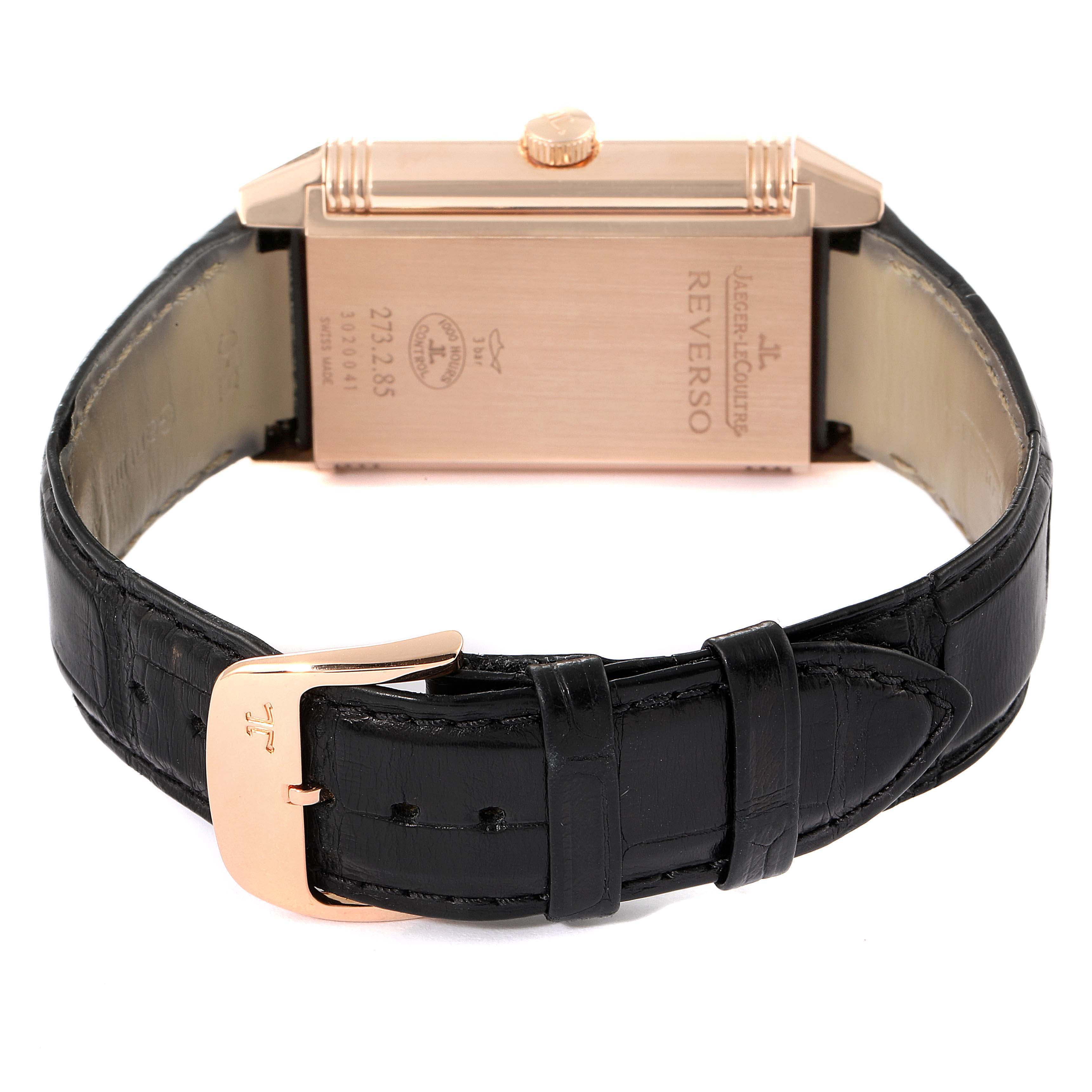 The image shows the back case and leather strap of a Jaeger LeCoultre Reverso Q3742521 Men's Rose Gold Silver Dial Q3742521 Men's Rose Gold Silver Dial watch, with visible branding and model details.