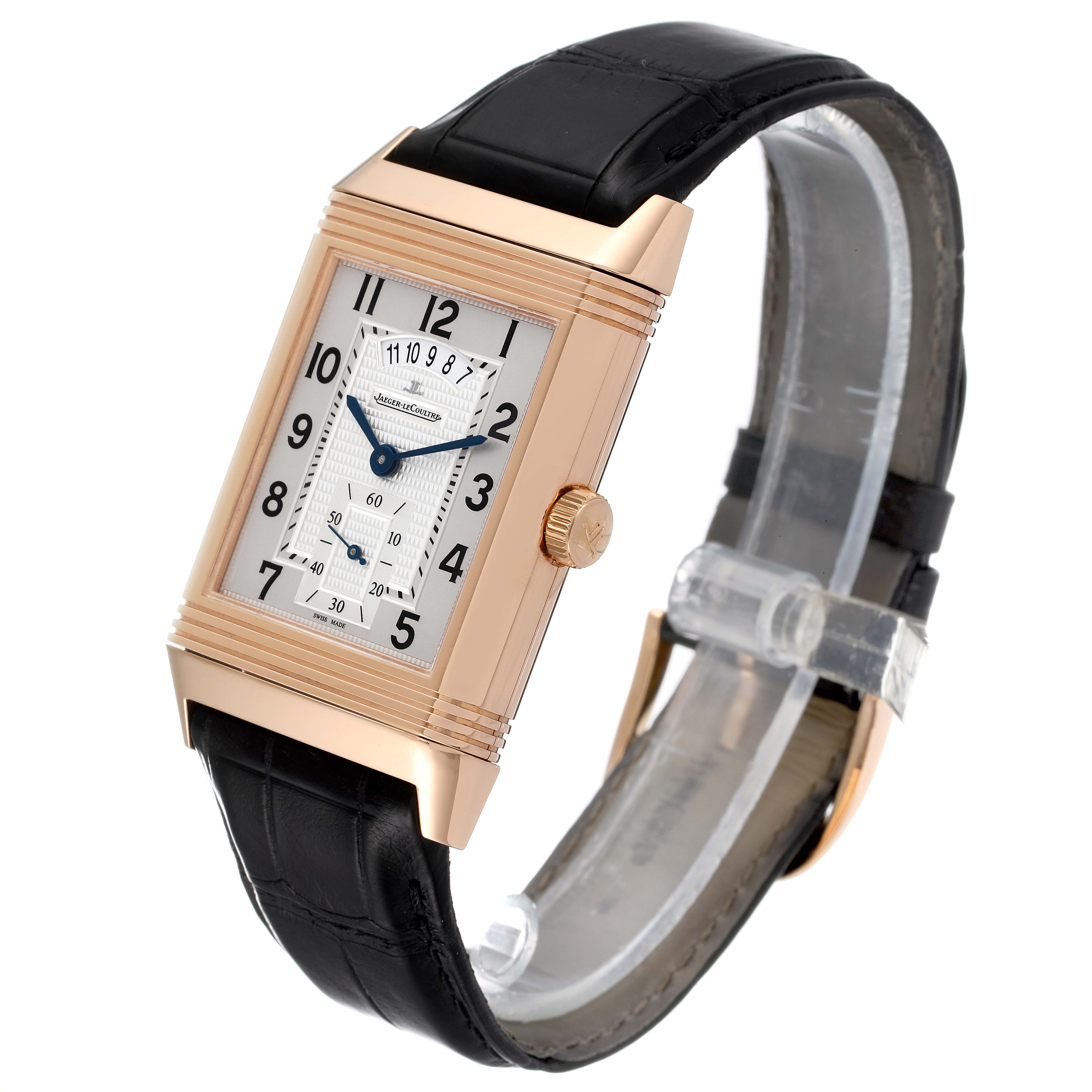 This Jaeger-LeCoultre Reverso watch is shown at a slight angle, displaying its rectangular face, black strap, and crown.
