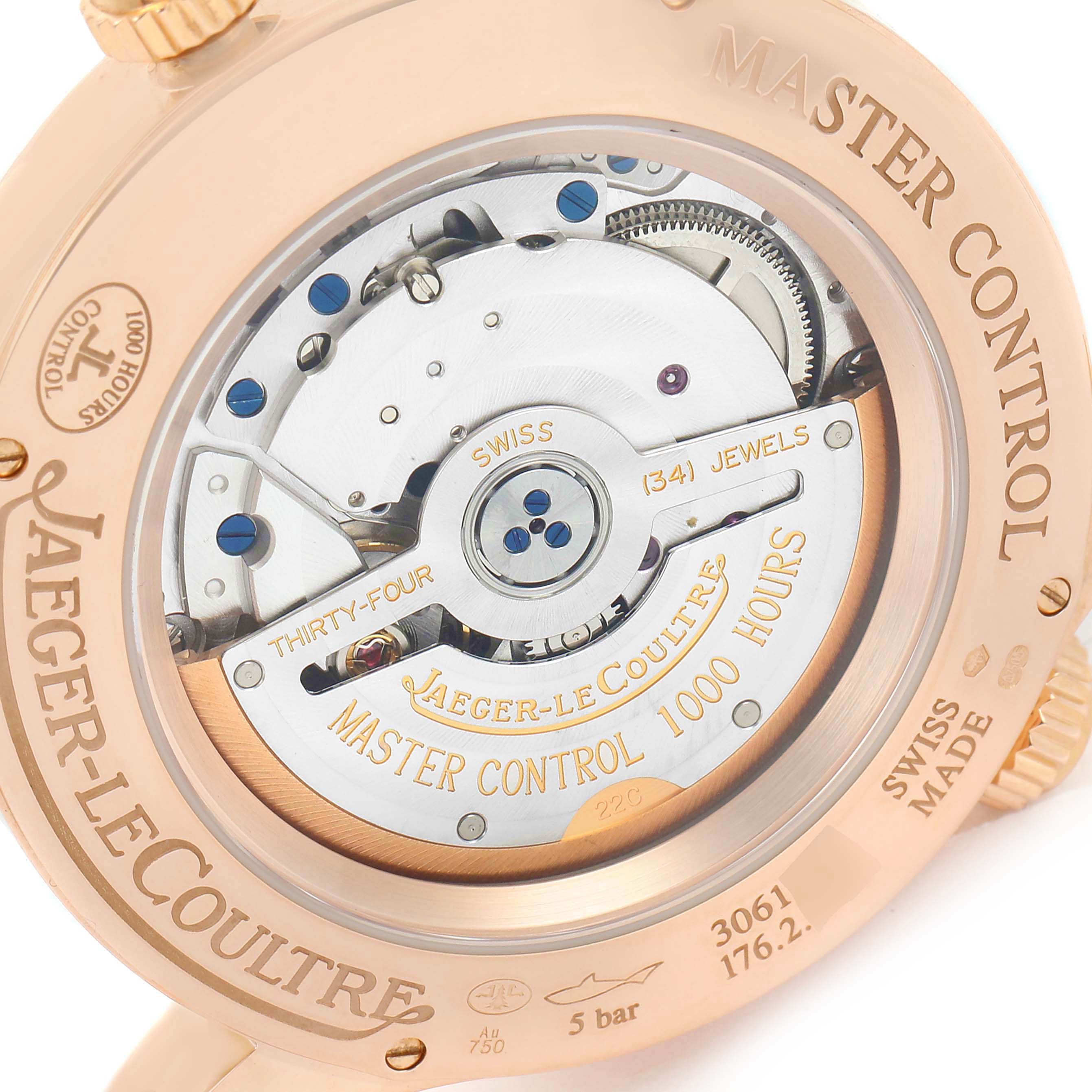 The image shows the rear view of a Jaeger-LeCoultre Master Control watch, displaying its inner mechanism.