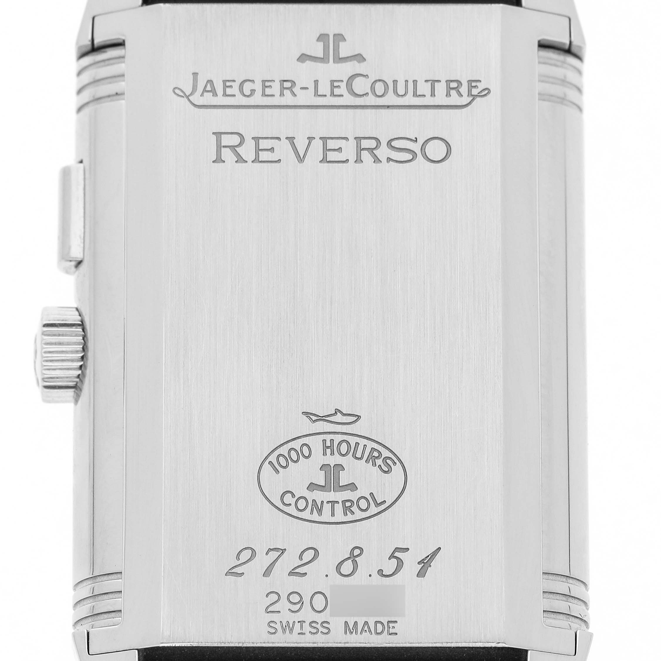 The image shows the back of the Jaeger-LeCoultre Reverso watch, highlighting its engravings and control seal.