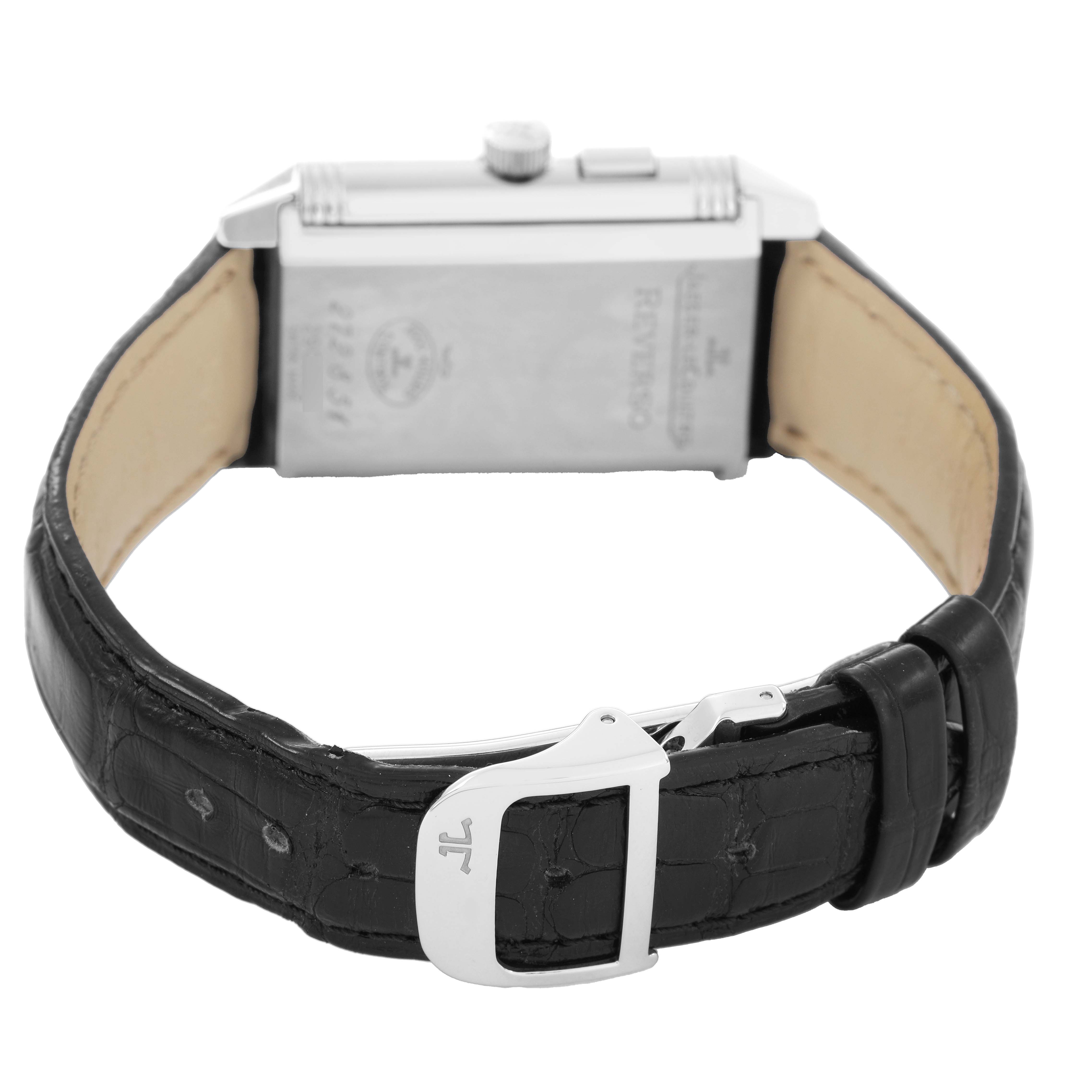 The image shows the back view of the Jaeger-LeCoultre Reverso watch, displaying the case, crown, and leather strap with clasp.