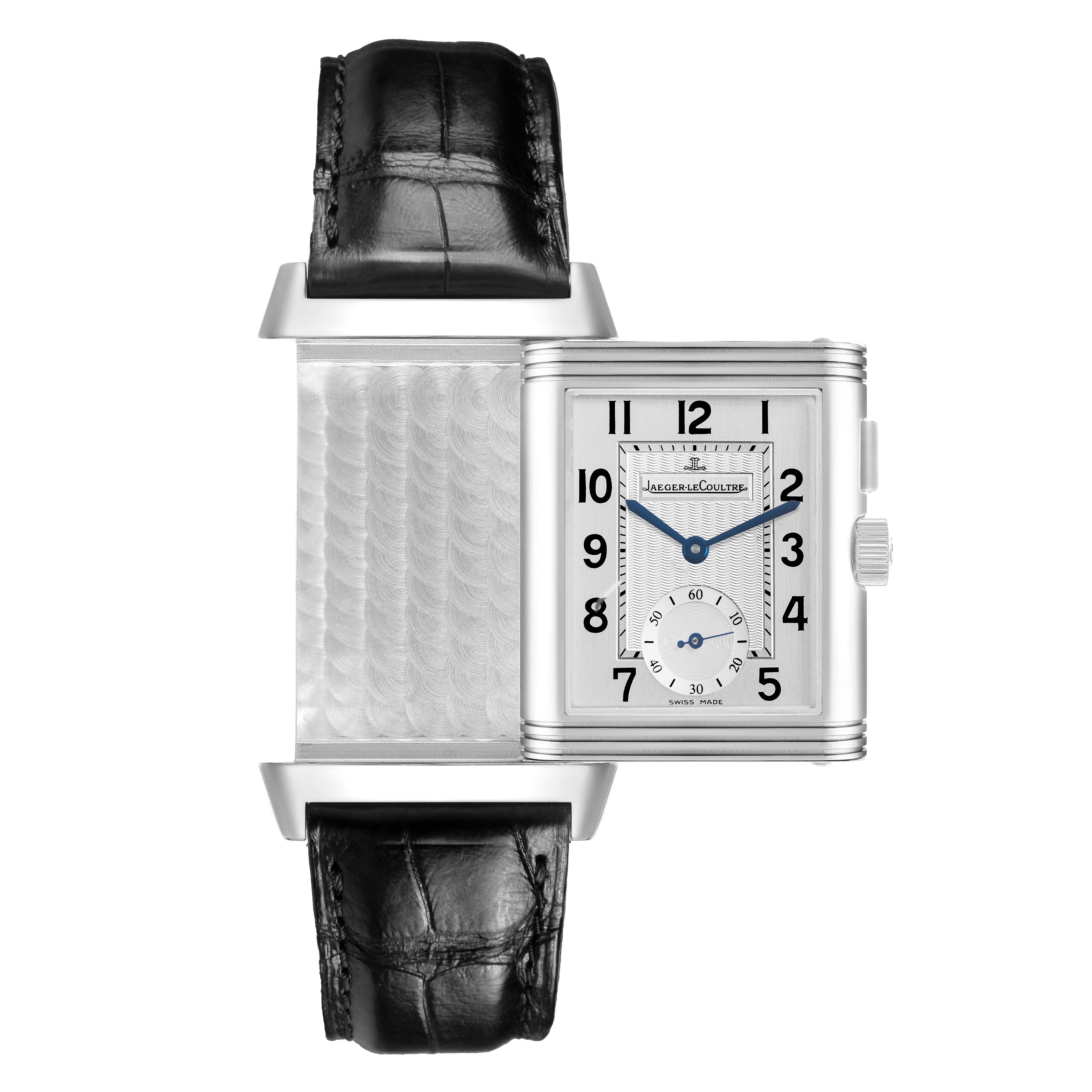 This Jaeger-LeCoultre Reverso watch shows a frontal view with the mechanism partially rotated, revealing both the dial and engraved back.