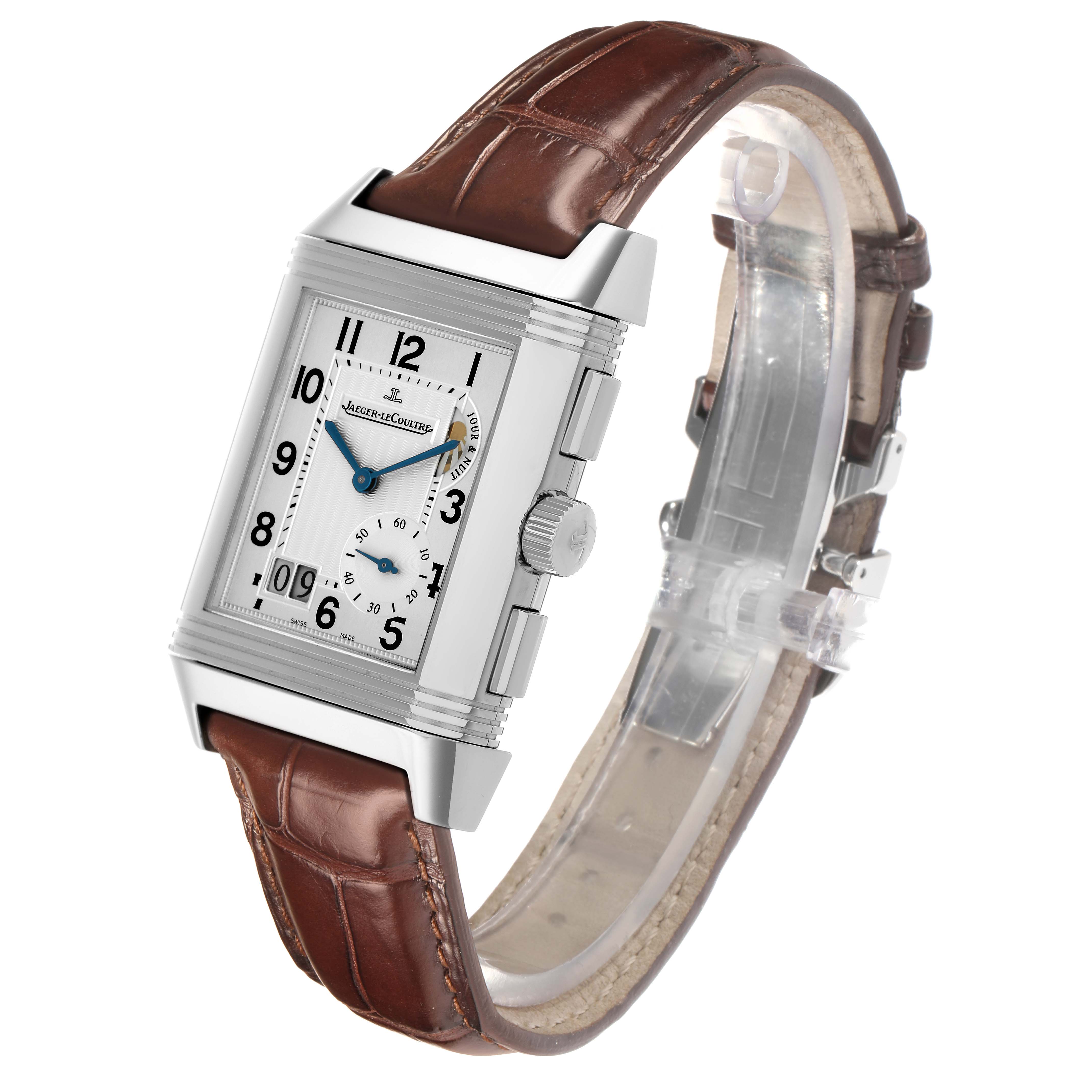 The Jaeger LeCoultre Reverso Q3028420 Men's Stainless Steel Silver Dial watch is shown at a slight angle, highlighting its rectangular face, strap, and side crown.