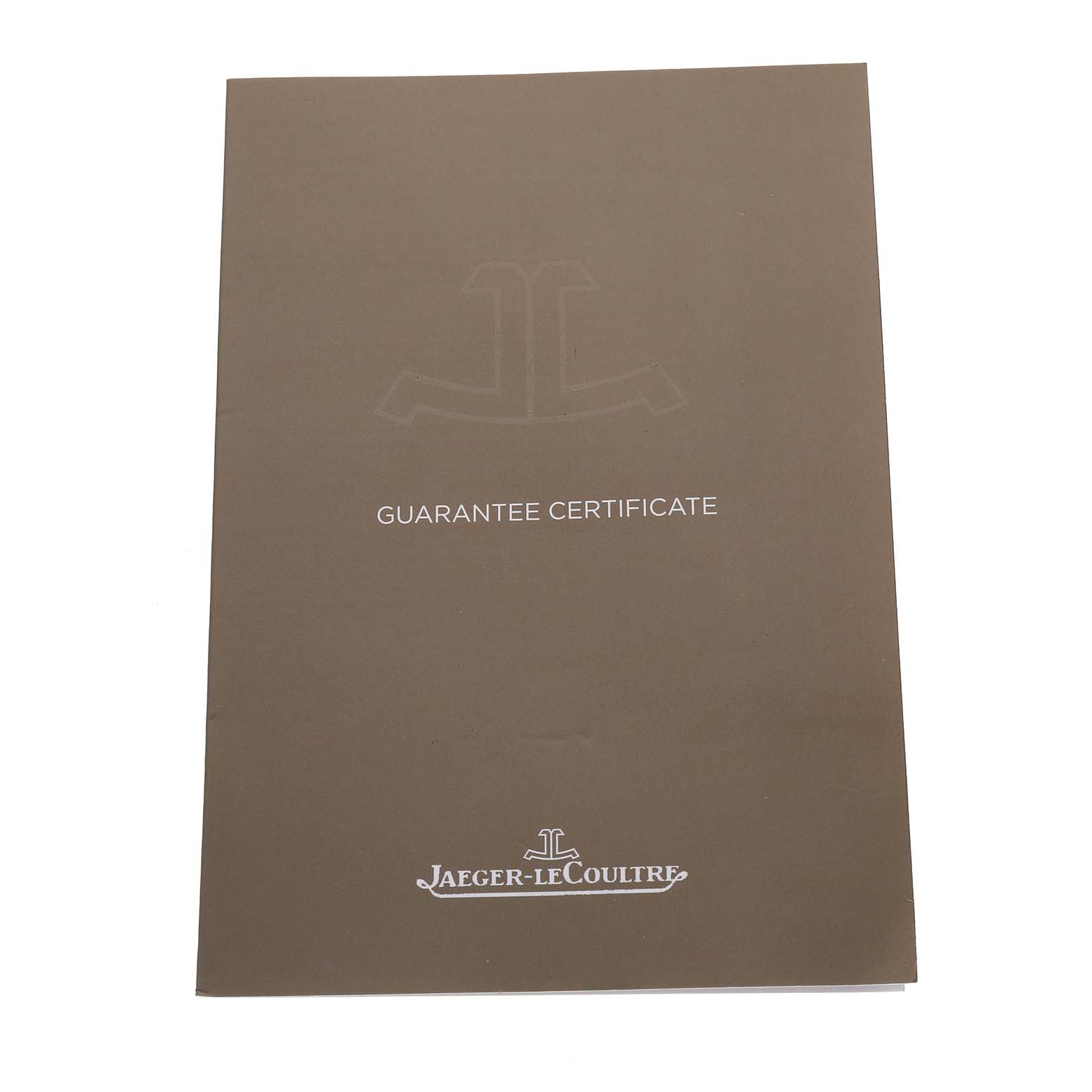 The image shows the guarantee certificate for the Jaeger-LeCoultre Reverso watch, photographed from the top.