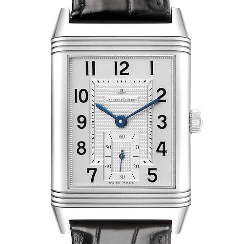 The Jaeger-LeCoultre Reverso watch is shown from a front angle, highlighting the dial, hands, and case.