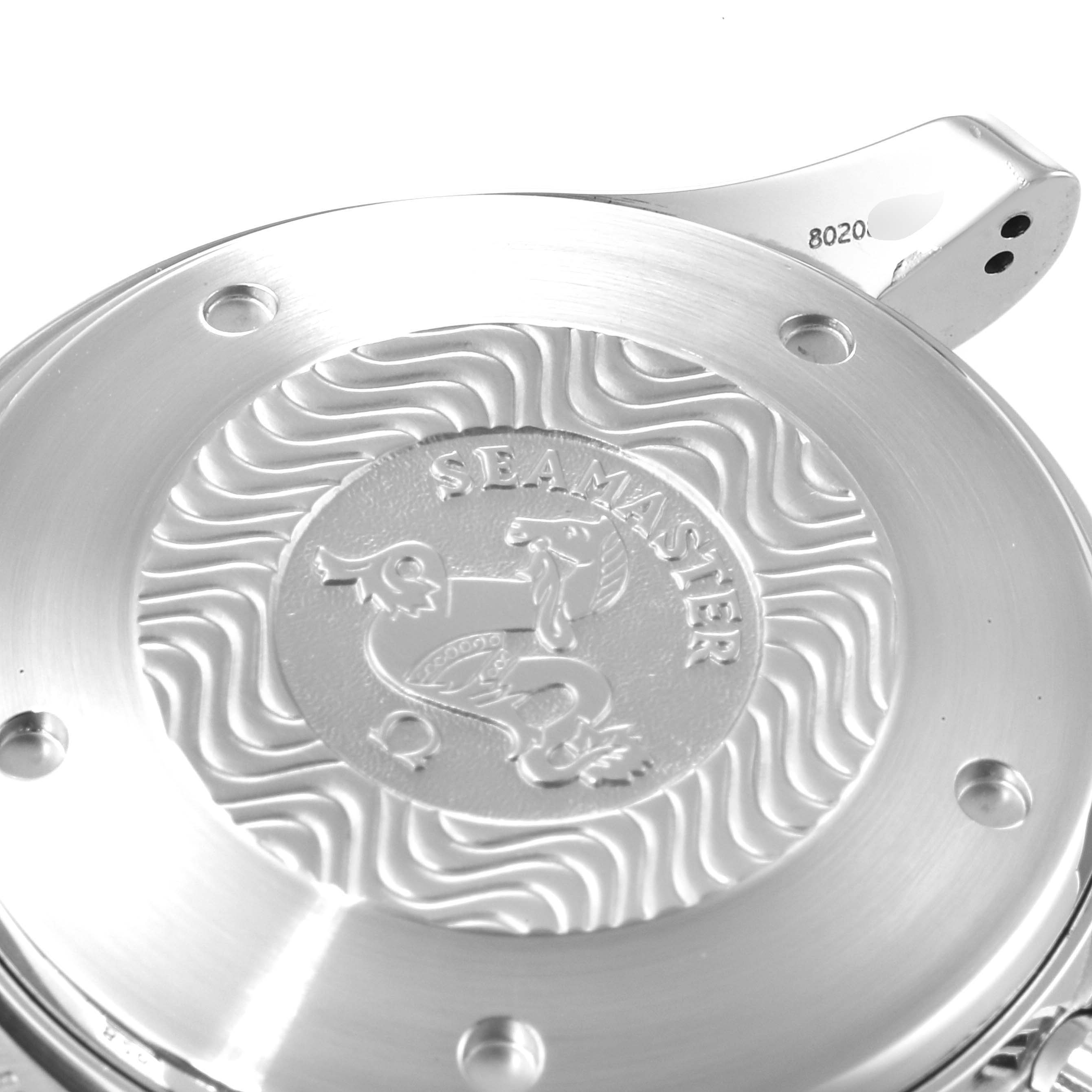 The image shows the back case of an Omega Seamaster 2599.80.00 Men's Stainless Steel Blue Dial 2599.80.00 Men's Stainless Steel Blue Dial watch, featuring its signature engraving and wave pattern.