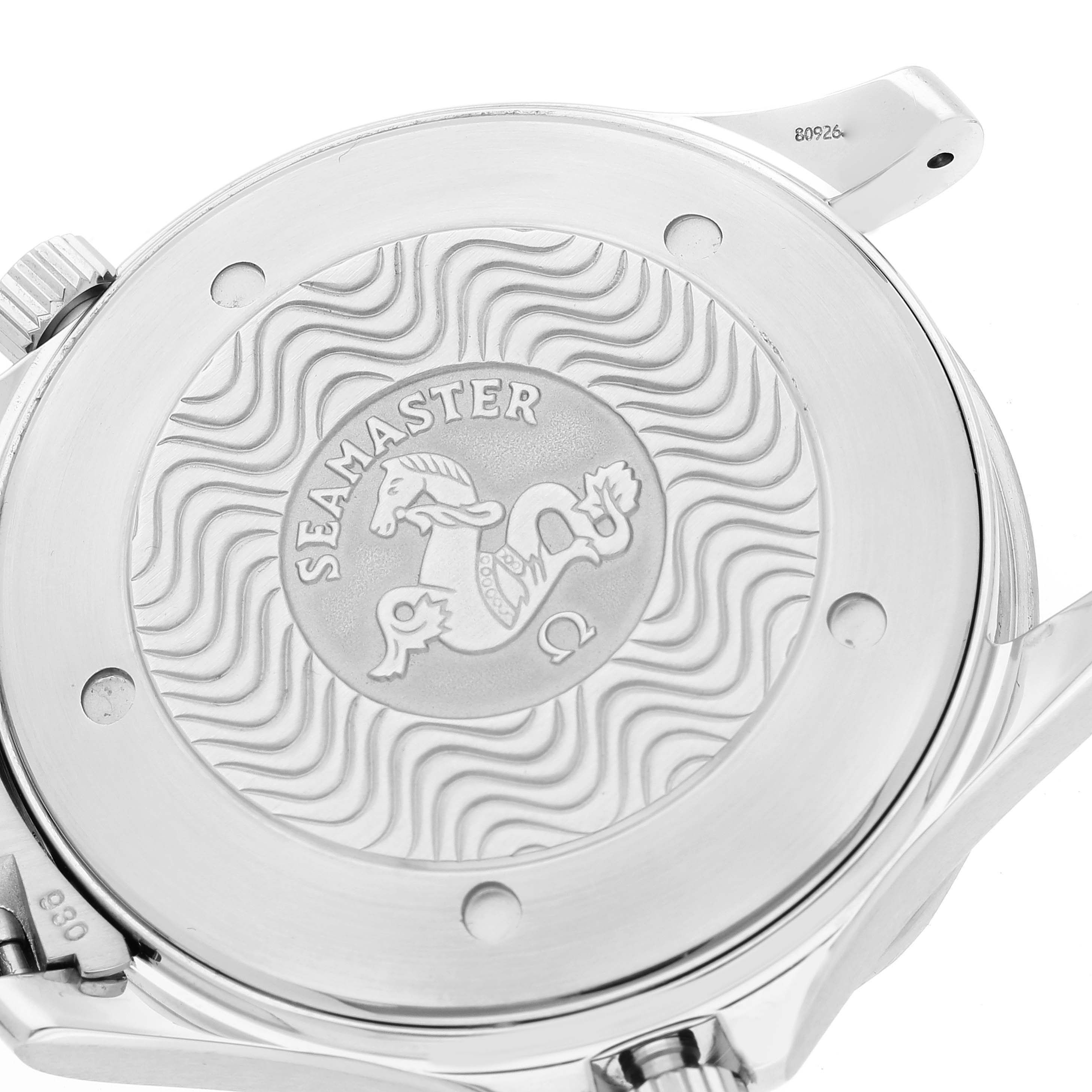 The image shows the backside of an Omega Seamaster 2254.50.00 Men's Stainless Steel Black Dial 2254.50.00 Men's Stainless Steel Black Dial watch, highlighting its engraved case back design and wavy pattern.