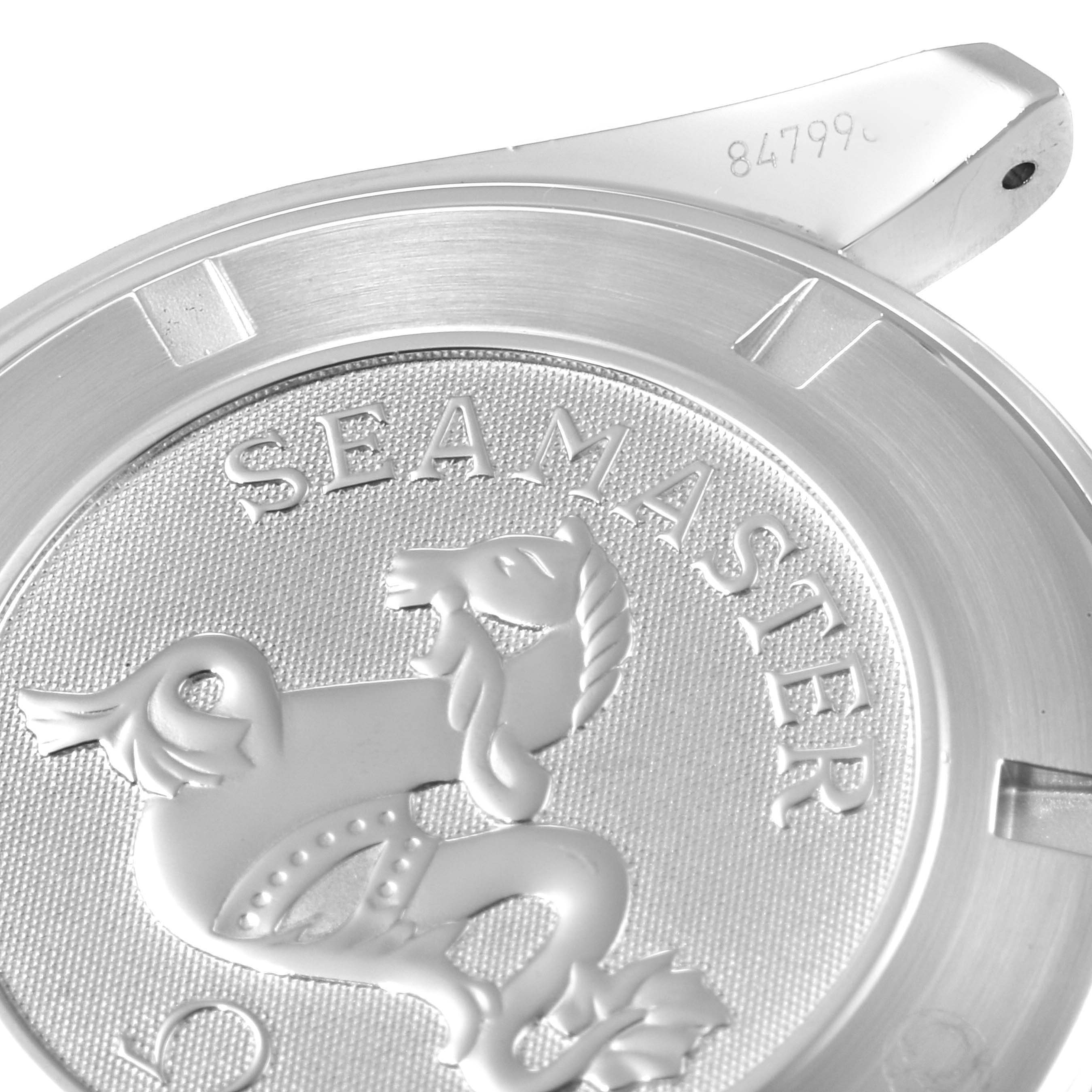 The image shows the back cover of an Omega Planet Ocean 232.32.46.21.01.001 Men's Stainless Steel Black Dial 232.32.46.21.01.001 Men's Stainless Steel Black Dial watch, highlighting the "Seamaster" engraving and emblem.