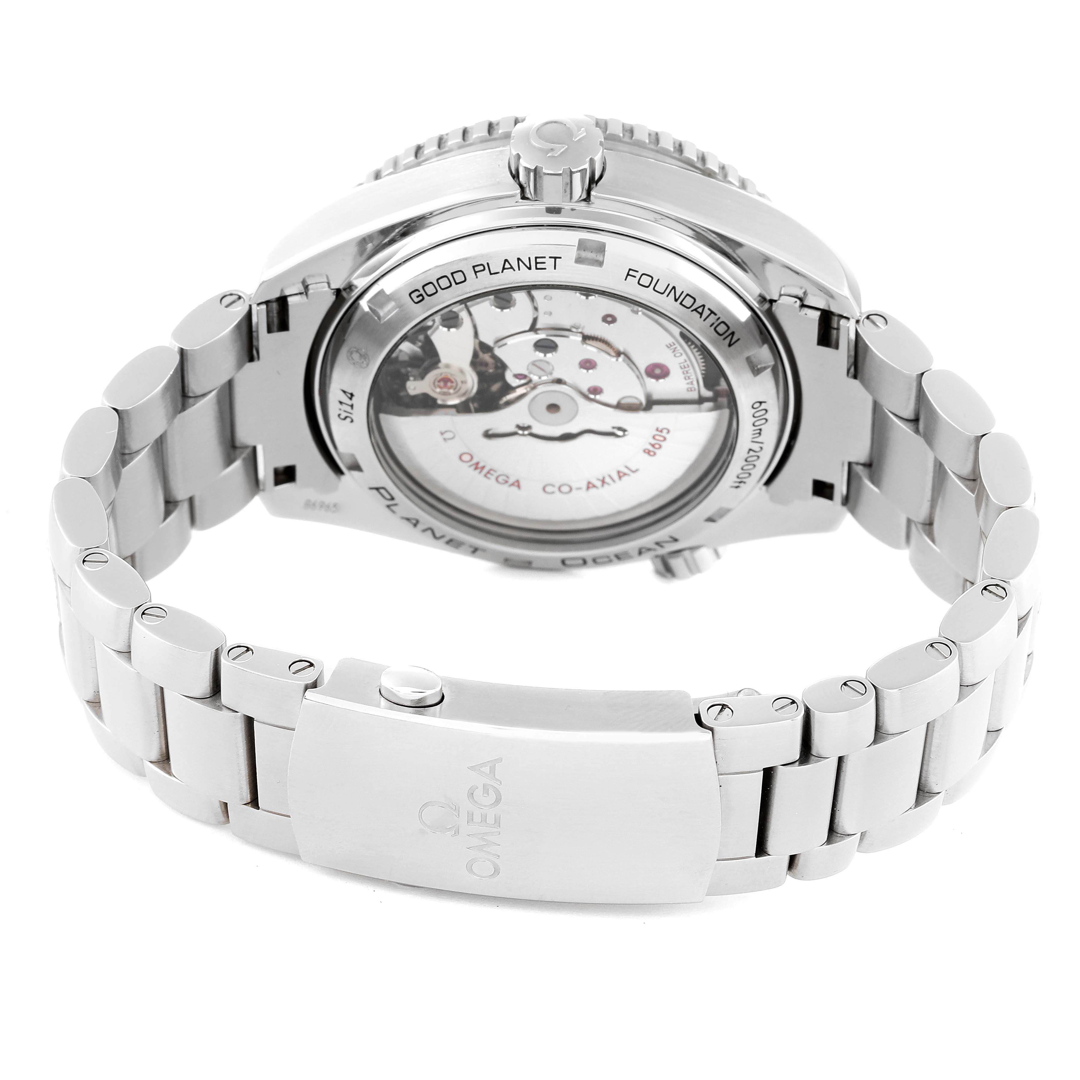 The image shows the back view of the Omega Planet Ocean 232.30.44.22.03.001 Men
s Stainless Steel Blue Dial 232.30.44.22.03.001 Men
s Stainless Steel Blue Dial watch, highlighting its transparent case back and stainless steel bracelet.