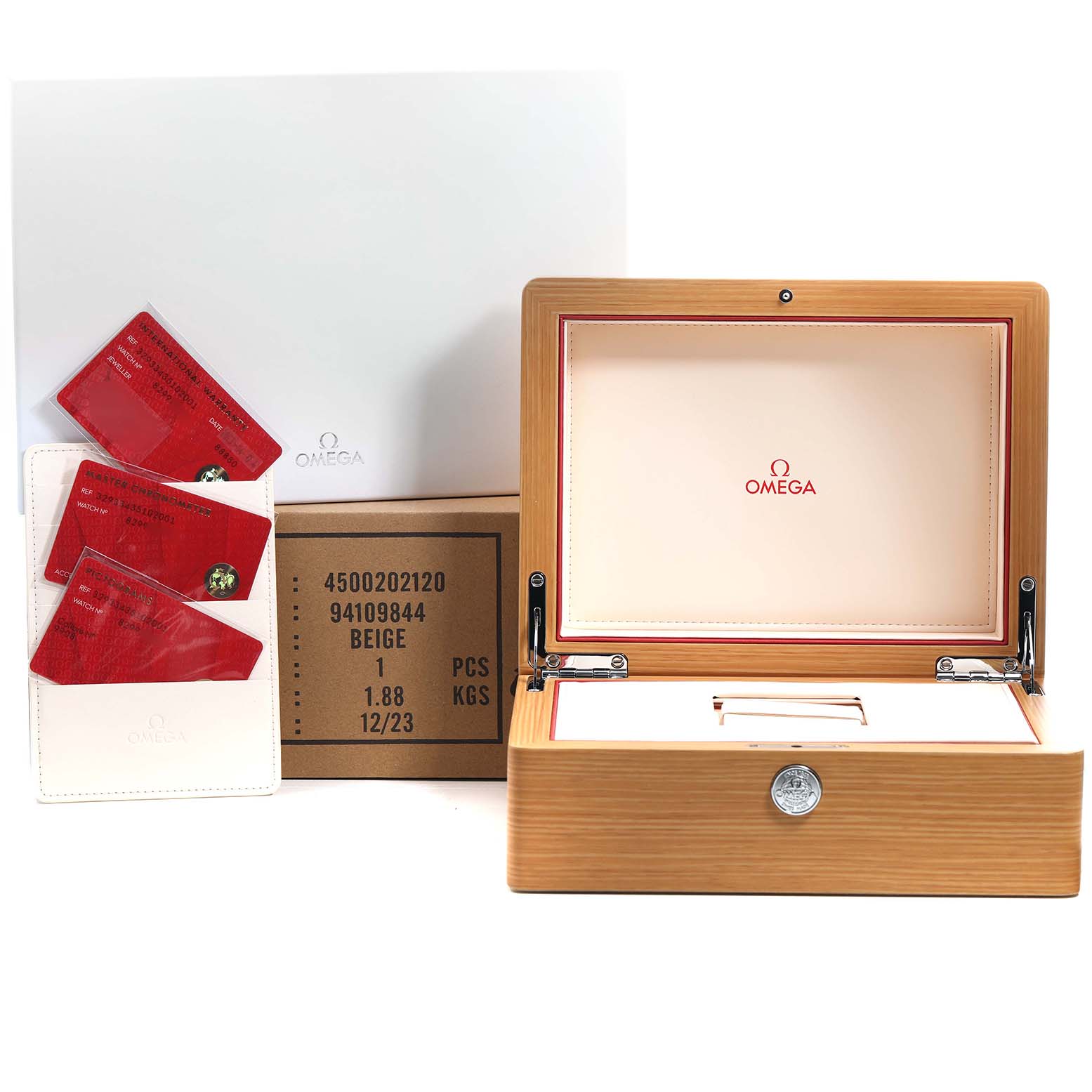 The image shows the Omega Speedmaster 329.33.43.51.02.001 Men's Stainless Steel Silver Dial watch box and accessories, including the open wooden case and warranty cards.