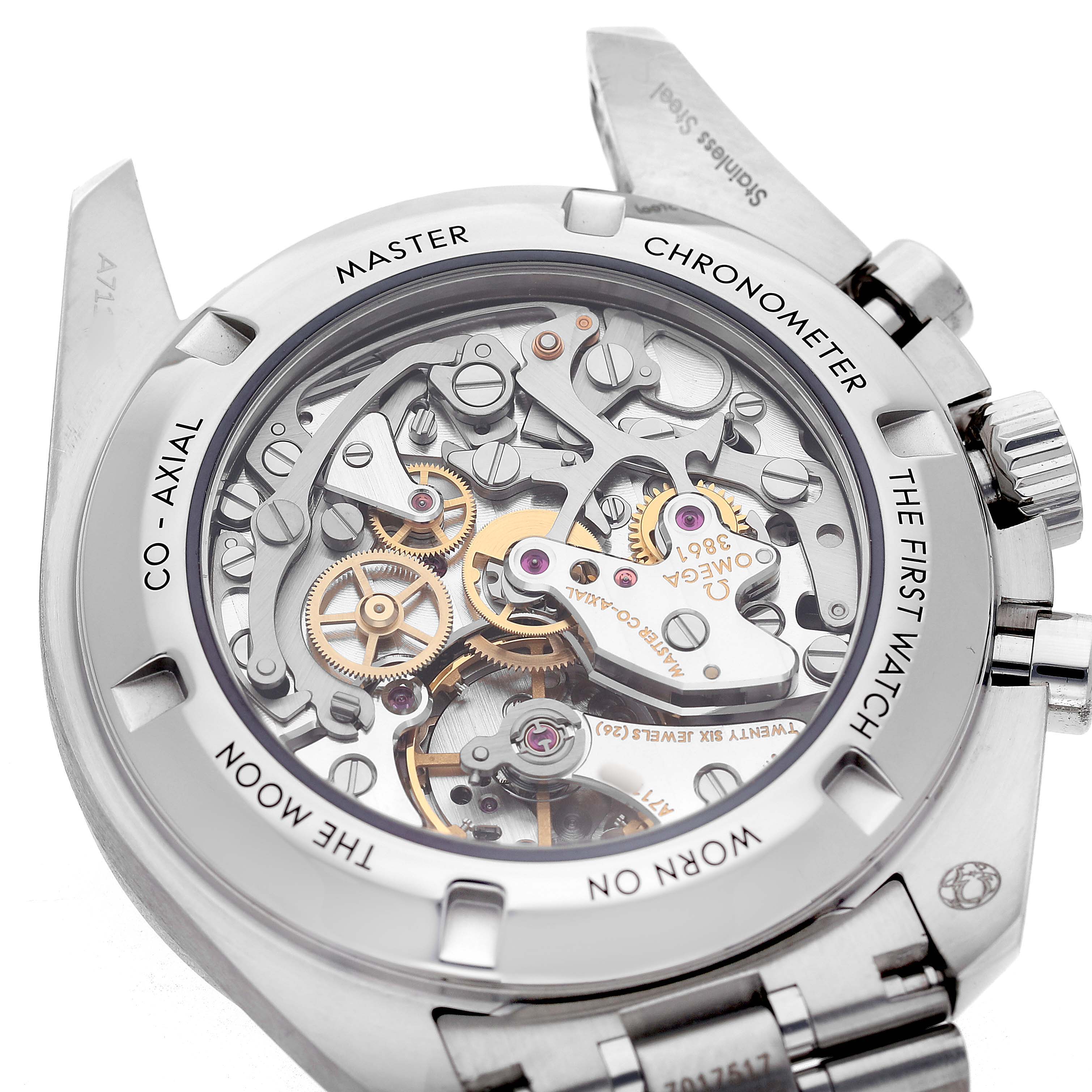 The image shows the back view of an Omega Speedmaster 310.30.42.50.04.001 Men's Stainless Steel White Dial, highlighting its intricate mechanical movement.