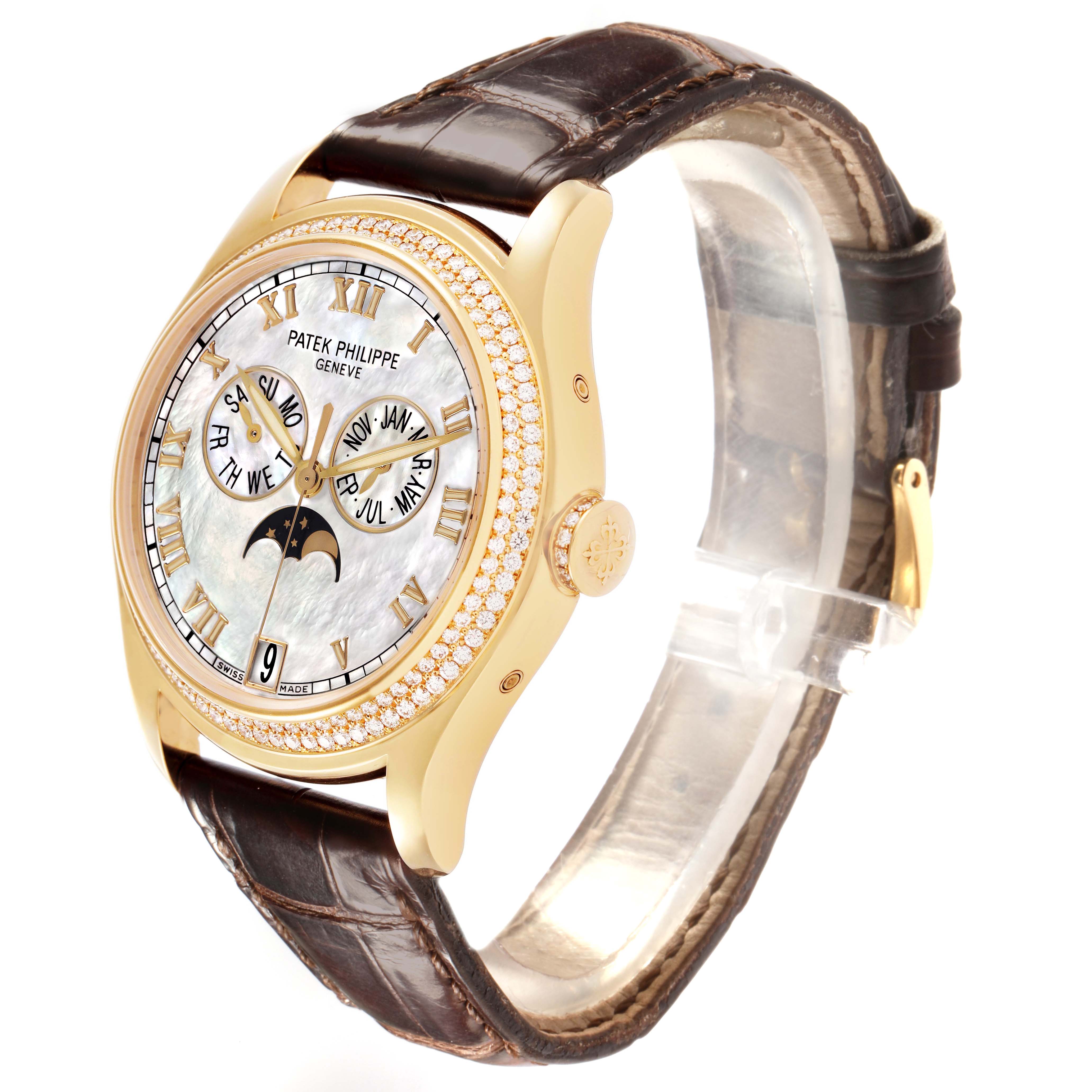 The Patek Philippe Complications 4936J Men's Yellow Gold Mother of Pearl Dial watch is shown from a three-quarter angle, highlighting the dial, bezel, crown, and leather strap.