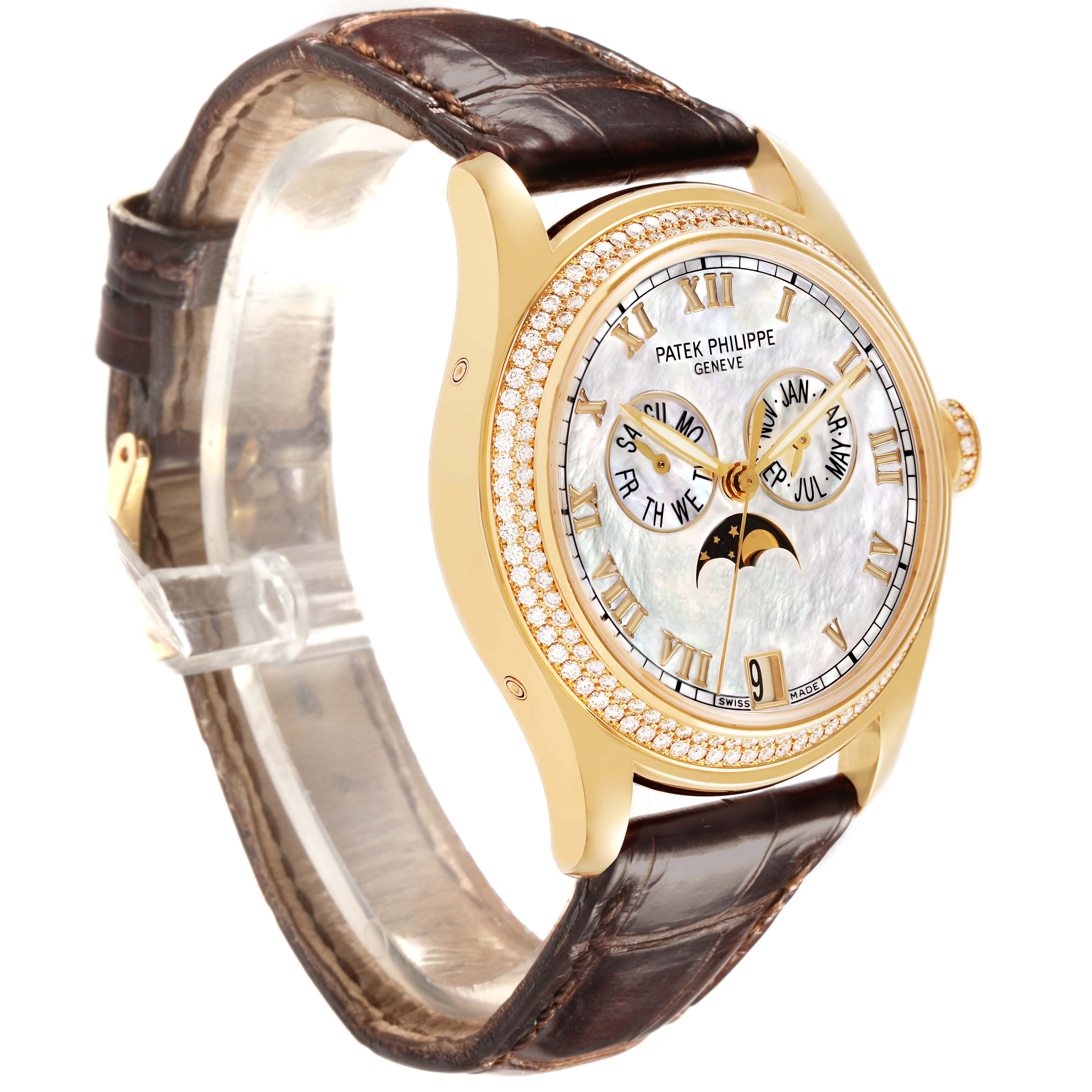 The Patek Philippe Complications 4936J Men's Yellow Gold Mother of Pearl Dial watch is shown at a side angle, highlighting the gold case, diamond bezel, leather strap, and dial complications.