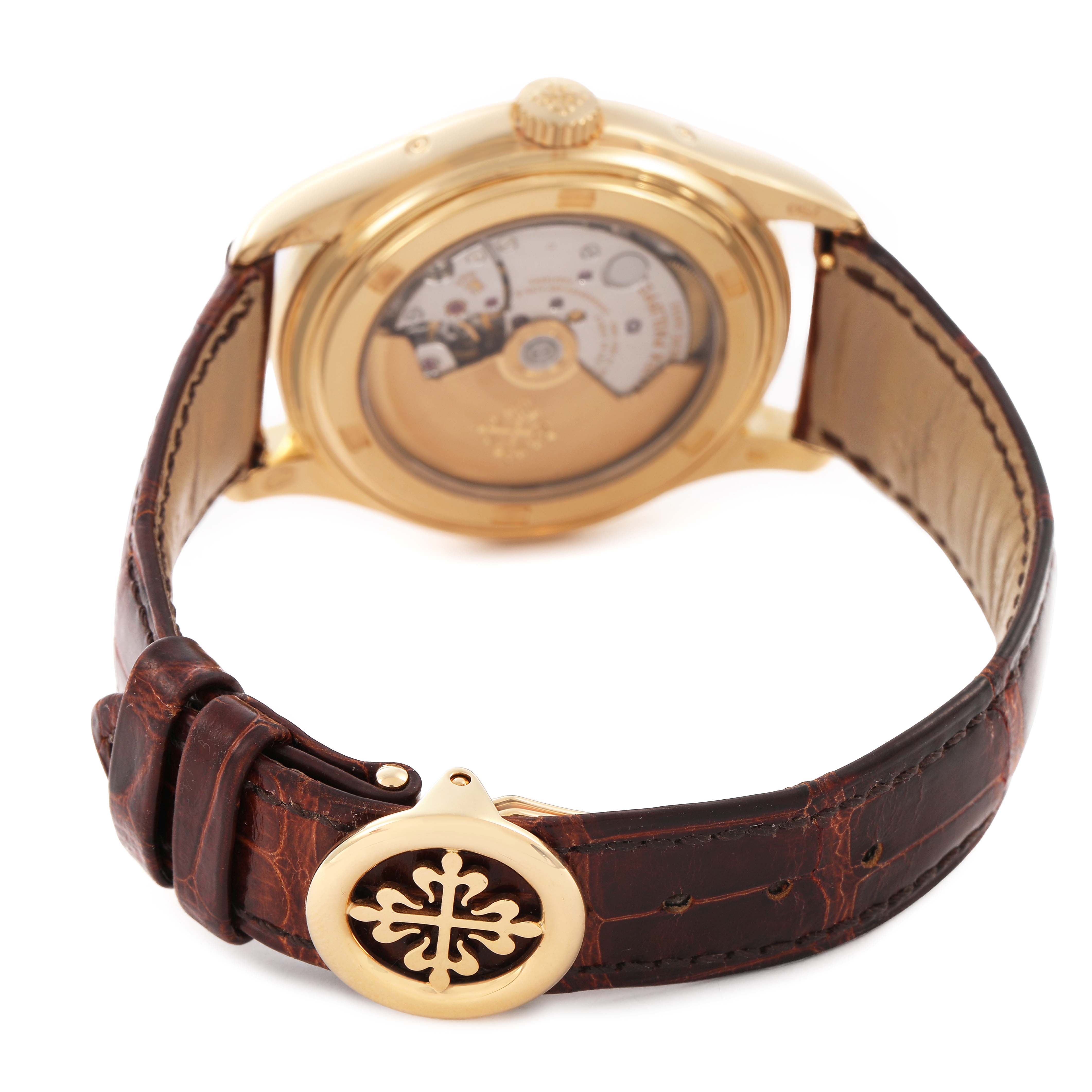 The Patek Philippe Complications 5146J Men's Yellow Gold Yellow Dial watch is shown from the rear angle, highlighting its open case back and leather strap.