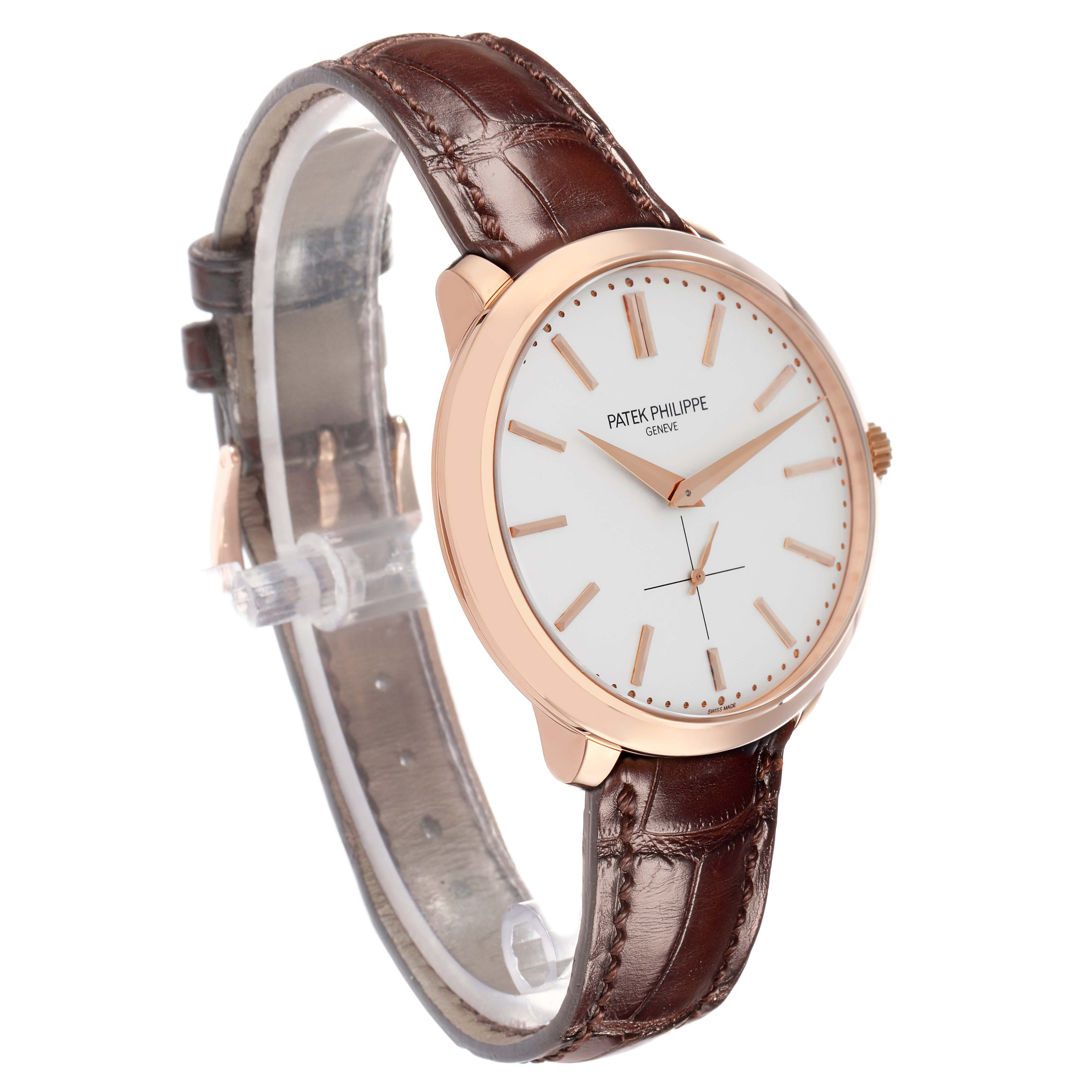 The Patek Philippe Calatrava 5123R Men
s Rose Gold Silver Dial watch is shown at an angled side view, highlighting its face, bezel, and brown leather strap.