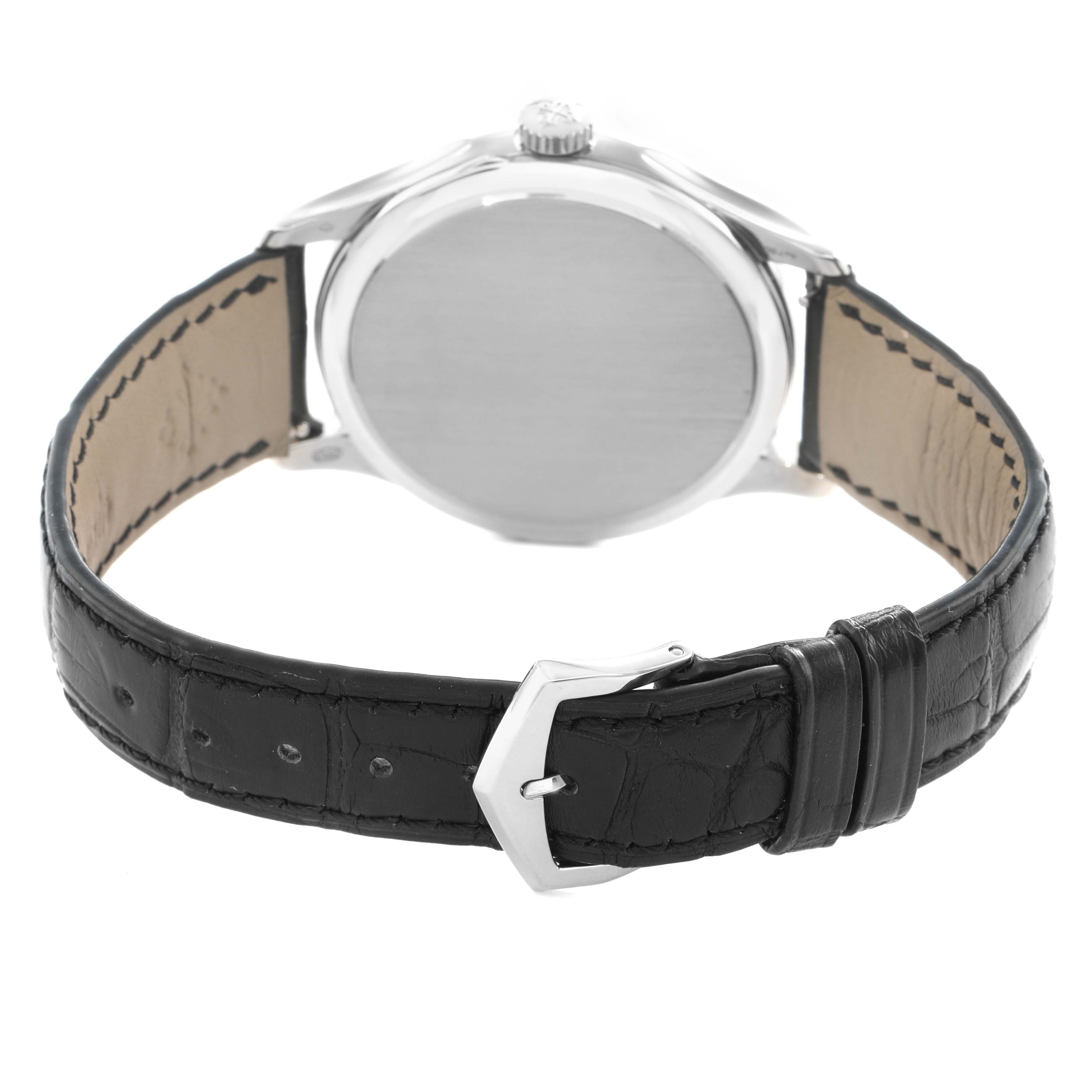 The image shows the back of a Patek Philippe Calatrava 5227G Men
s White Gold Black Dial watch, highlighting the strap and clasp from a rear angle.