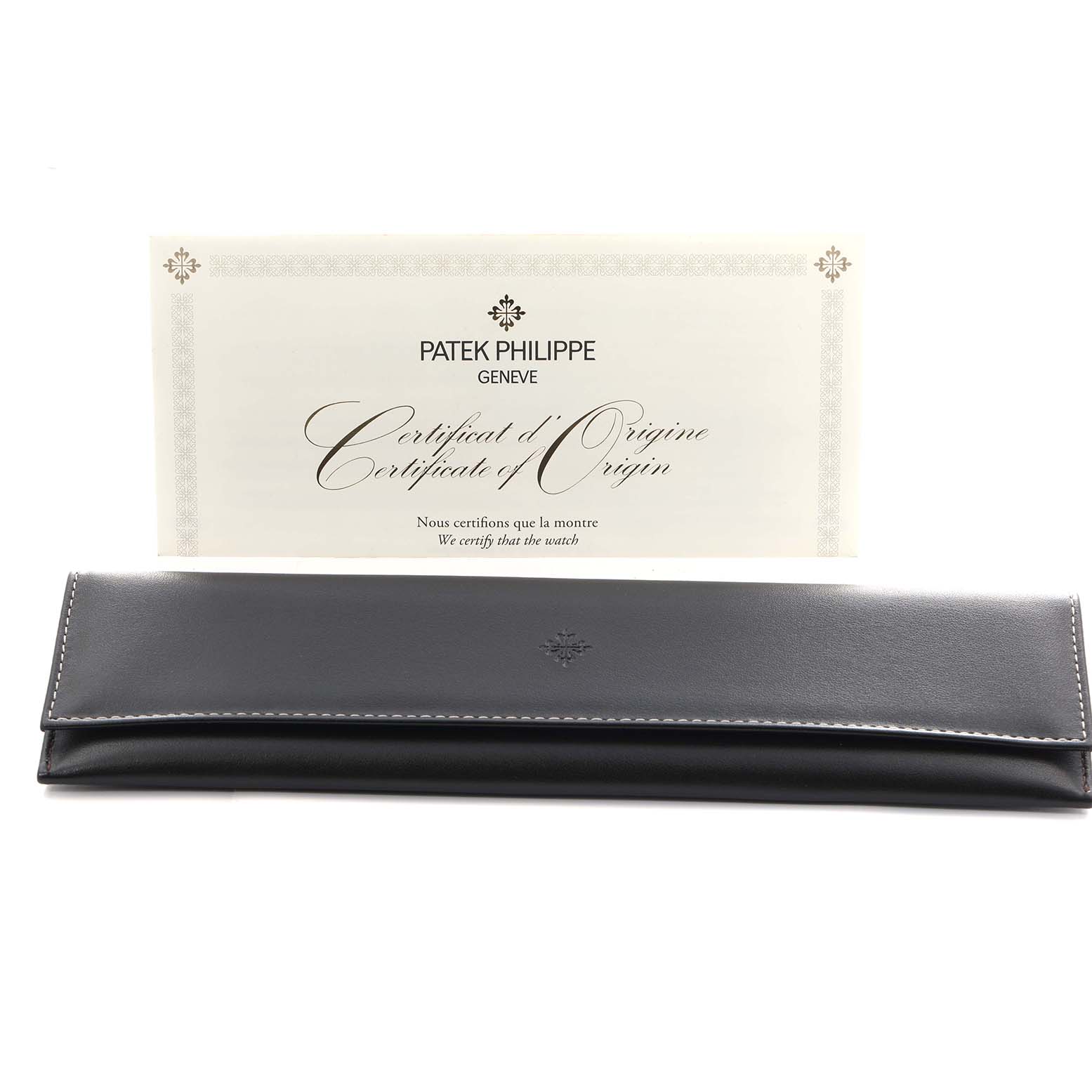 The image shows a Patek Philippe Calatrava 5227G Men
s White Gold Black Dial certificate and a black leather pouch from a frontal angle.