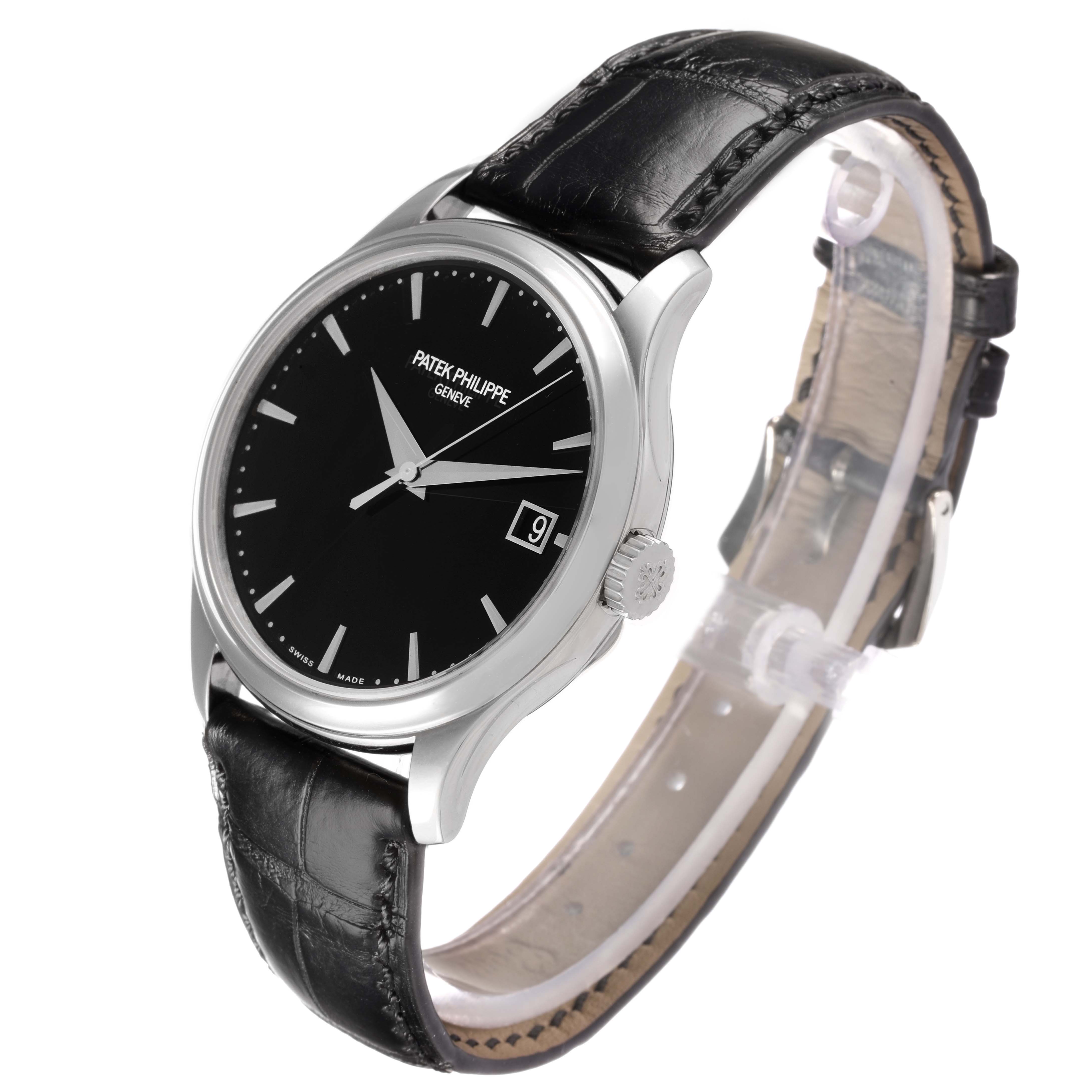 The Patek Philippe Calatrava 5227G Men
s White Gold Black Dial watch is shown at a slight side angle, displaying the face, case, crown, and leather strap.