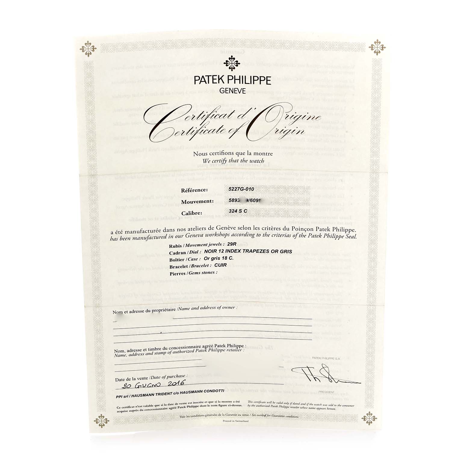 This image shows a Patek Philippe Certificate of Origin for a Calatrava model watch, featuring reference and movement details.