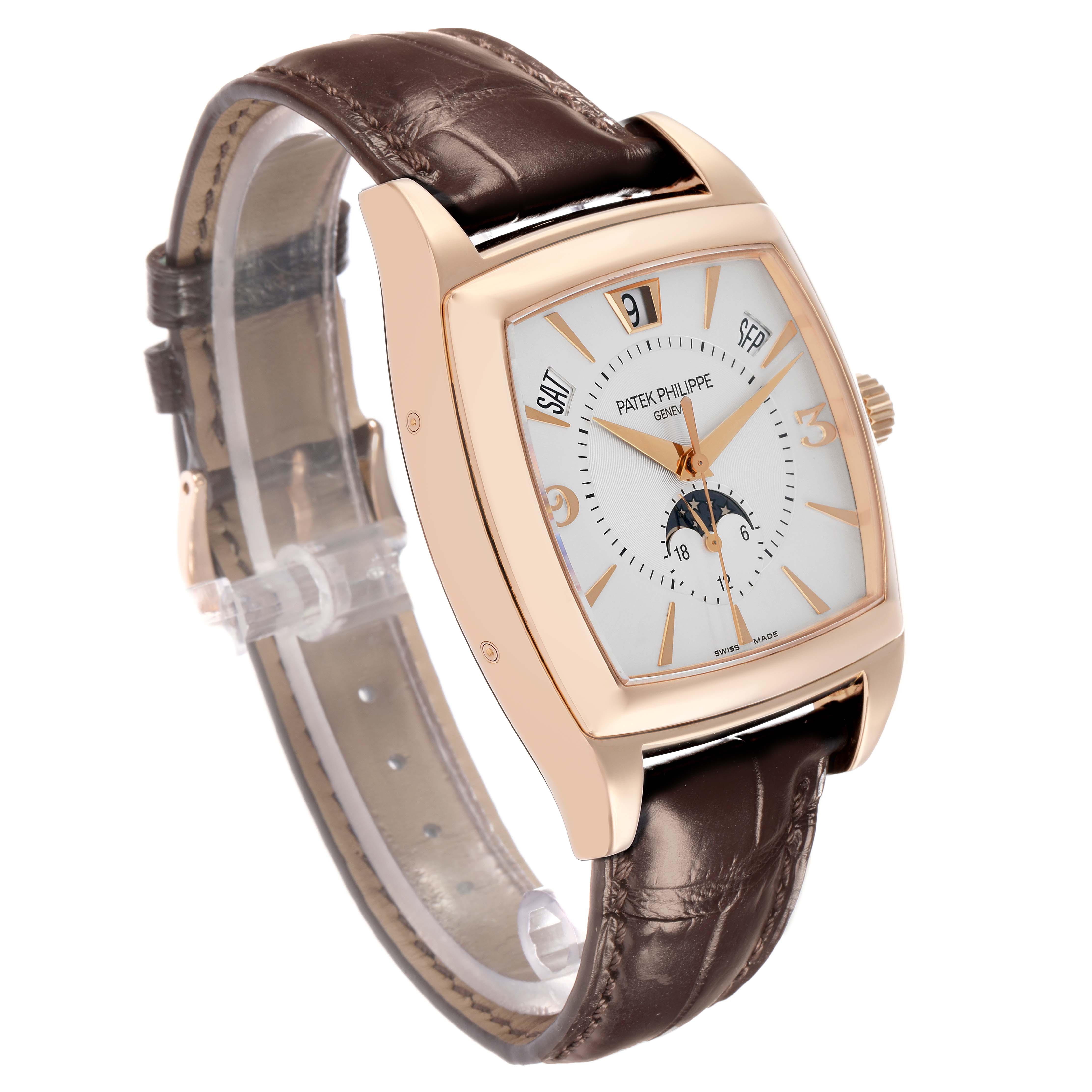 The Patek Philippe Gondolo 5135R Men
s Rose Gold White Dial watch is shown at a three-quarter angle, highlighting its dial, case, and brown leather strap.