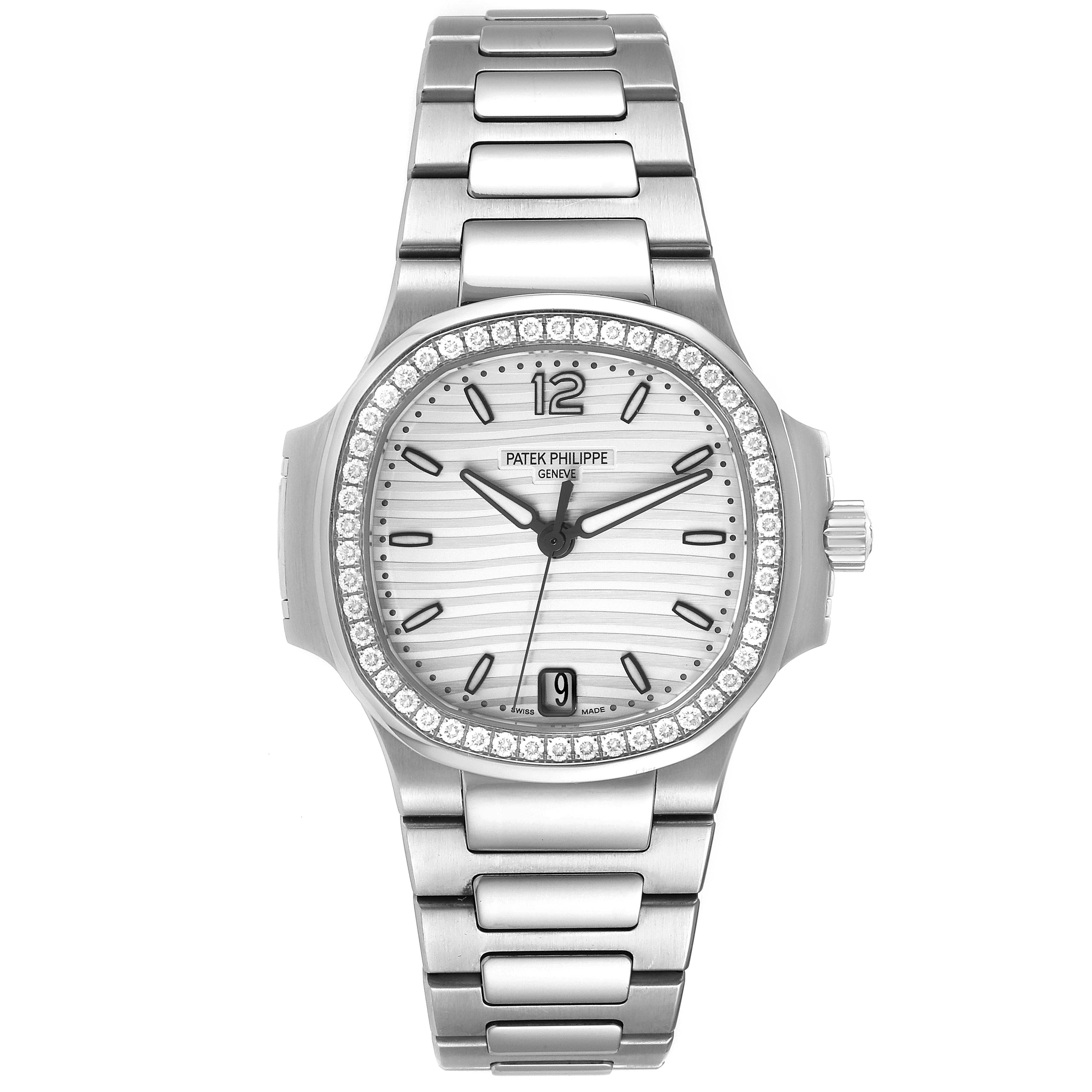 The image shows a front view of a Patek Philippe Nautilus 7018/1A-001 Women's Stainless Steel Silver Dial 7018/1A-001 Women's Stainless Steel Silver Dial watch with a stainless steel bracelet and diamond-encrusted bezel.