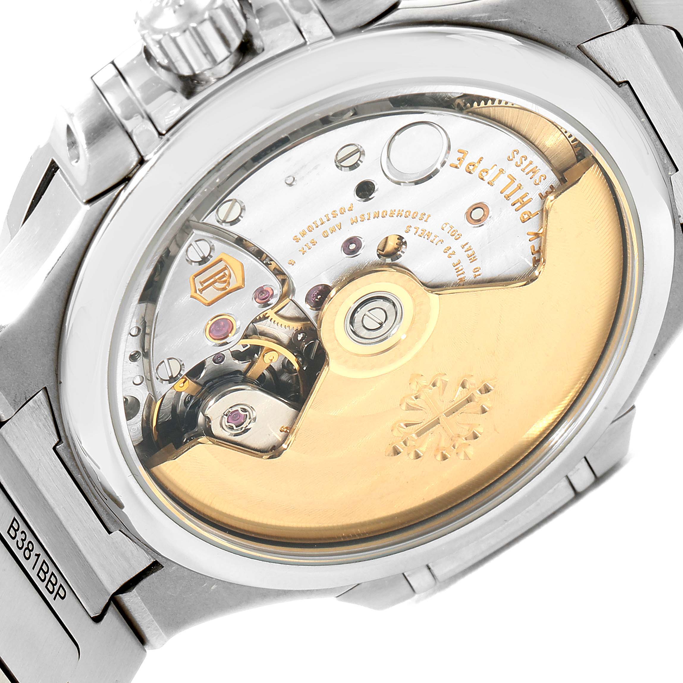 The image shows the back view of a Patek Philippe Nautilus 7018/1A-001 Women's Stainless Steel Silver Dial 7018/1A-001 Women's Stainless Steel Silver Dial watch, highlighting its movement and internal mechanism.