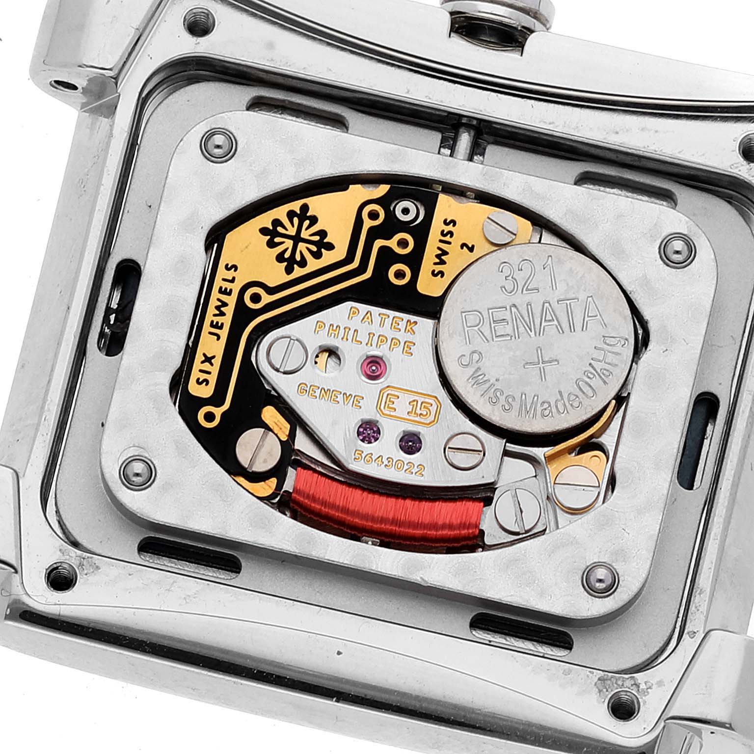 This image shows the Patek Philippe Twenty-4 4910-10A-012 Women's Stainless Steel Blue Dial 4910-10A-012 Women's Stainless Steel Blue Dial model watch's internal mechanism and battery from a close-up angle.