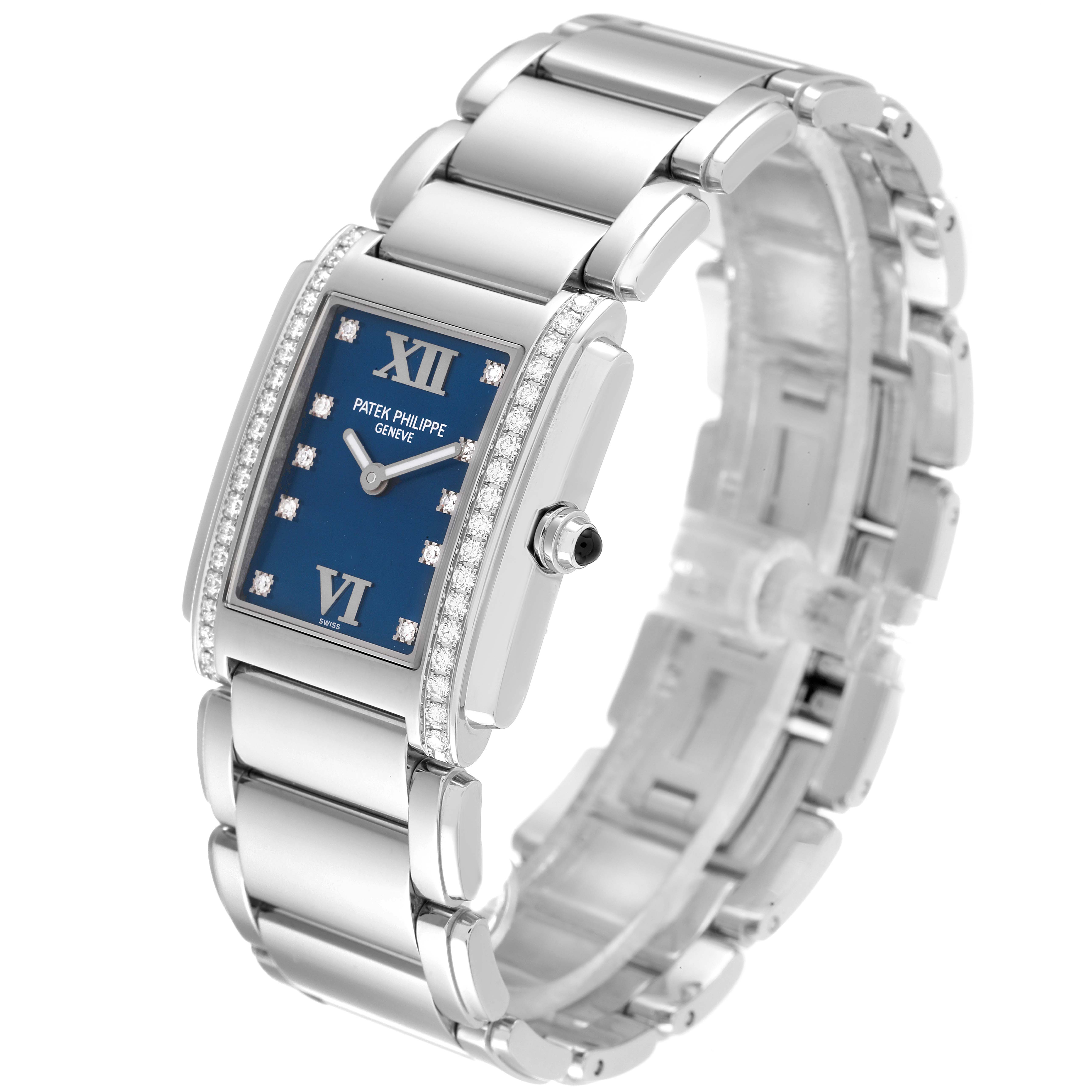The Patek Philippe Twenty-4 4910-10A-012 Women
s Stainless Steel Blue Dial 4910-10A-012 Women
s Stainless Steel Blue Dial watch is shown at a three-quarter angle, highlighting its blue dial, diamond bezel, and metal bracelet.
