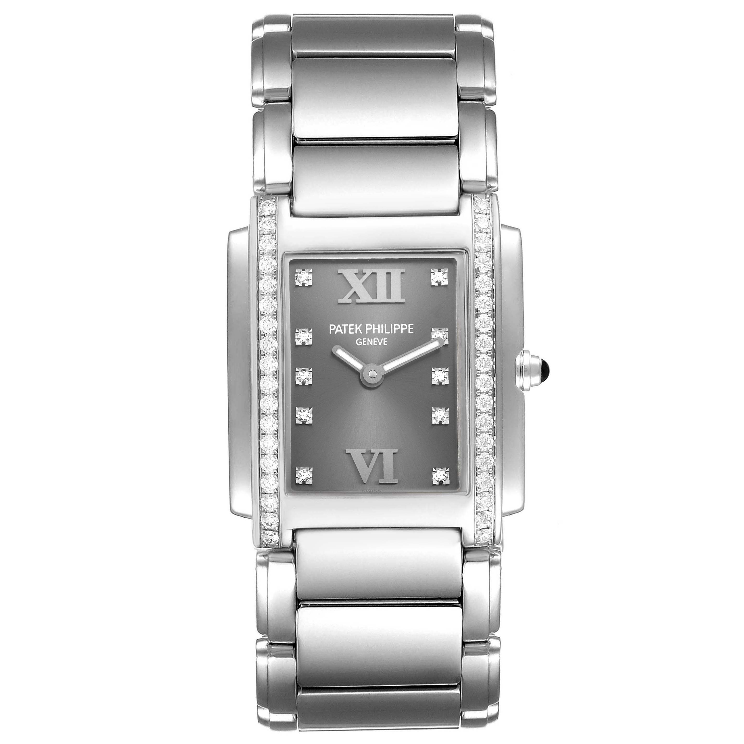 The image shows a front view of the Patek Philippe Twenty-4 4910/10A-010 Women
s Stainless Steel Grey Dial 4910/10A-010 Women
s Stainless Steel Grey Dial model, displaying the dial, bracelet, and bezel with diamonds.