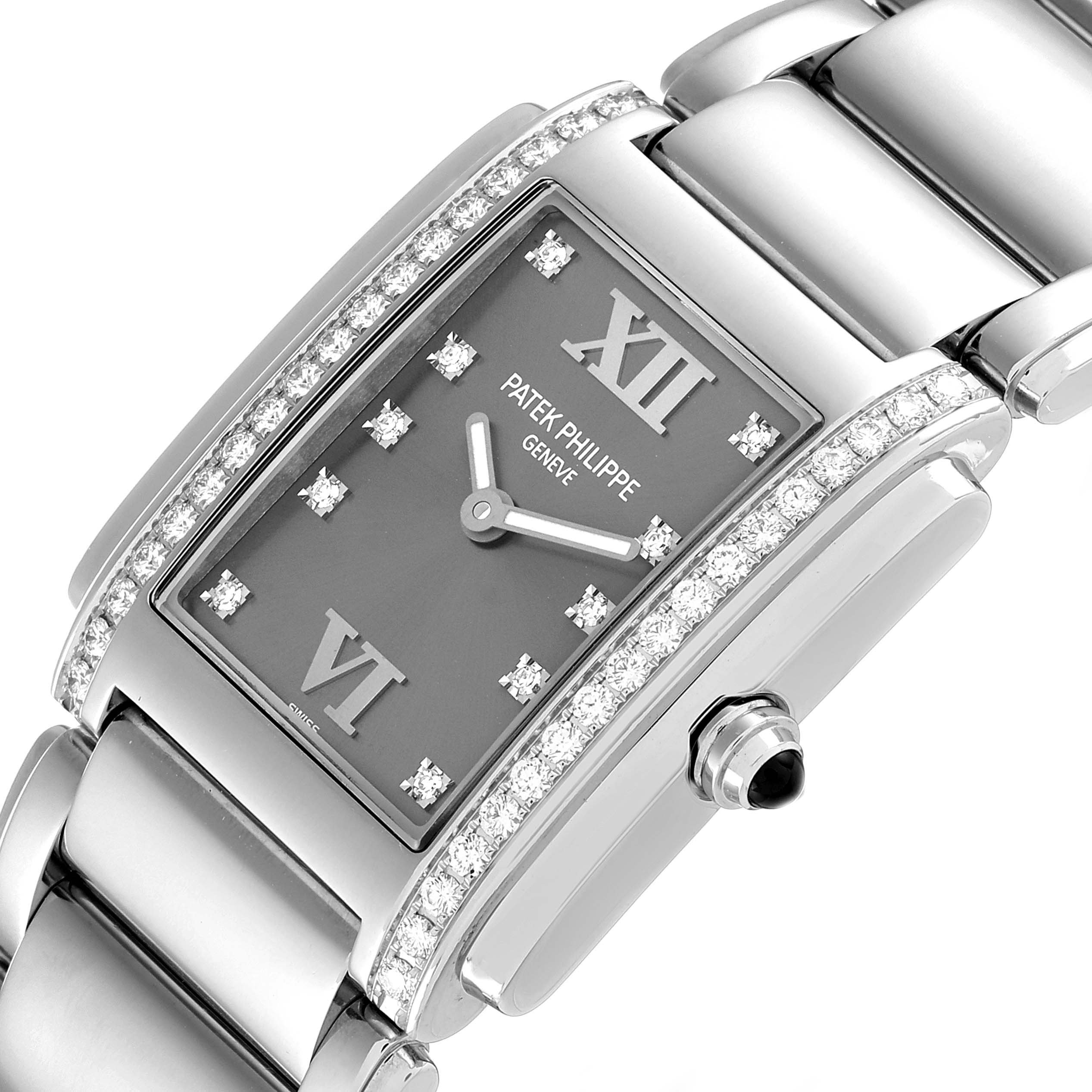 The image shows a close-up angle of the Patek Philippe Twenty-4 4910/10A-010 Women
s Stainless Steel Grey Dial 4910/10A-010 Women
s Stainless Steel Grey Dial watch, highlighting the face, dial, bezel, and bracelet.
